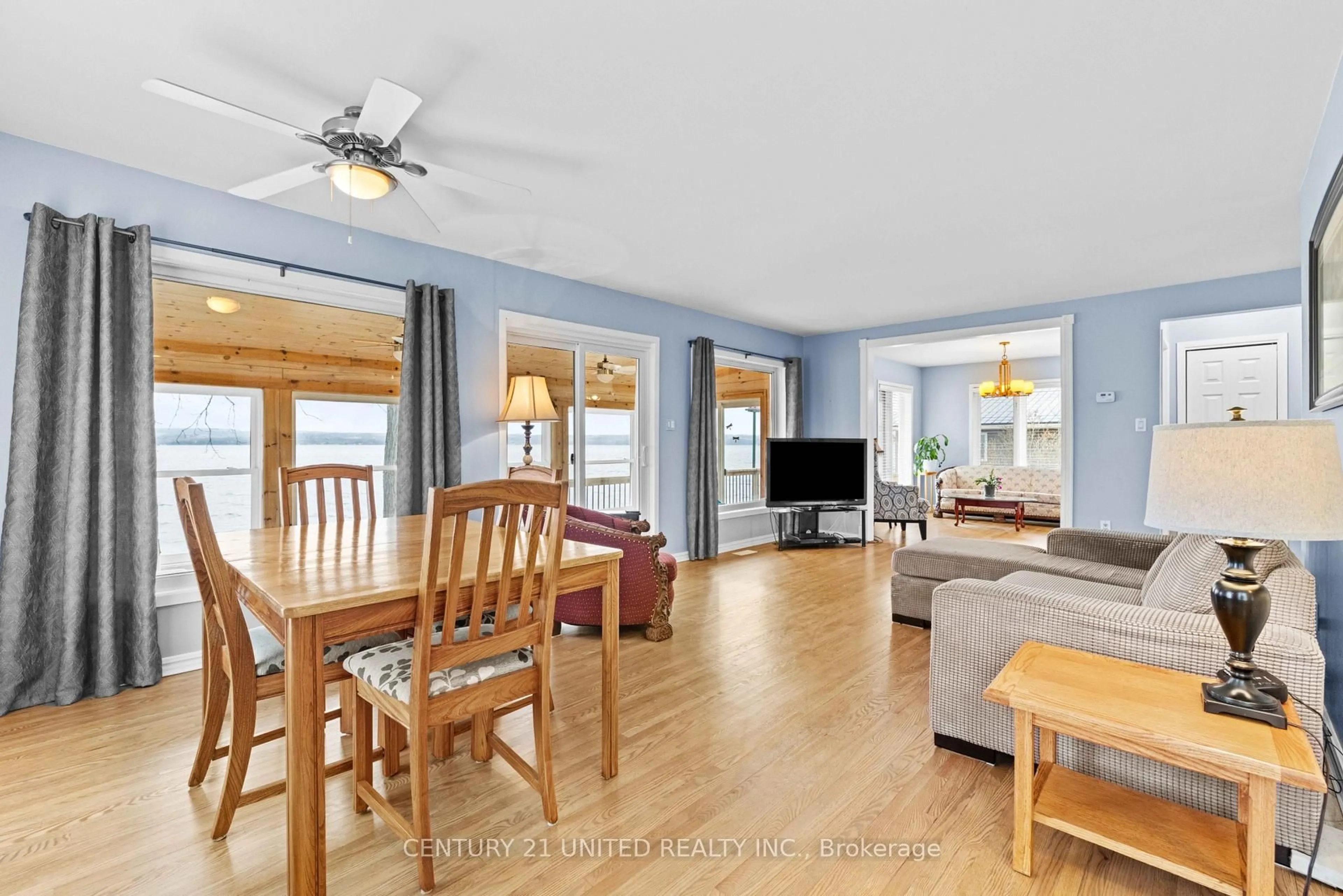 Living room with furniture, wood/laminate floor for 40 Ivey Lane, Otonabee-South Monaghan Ontario K0L 2G0