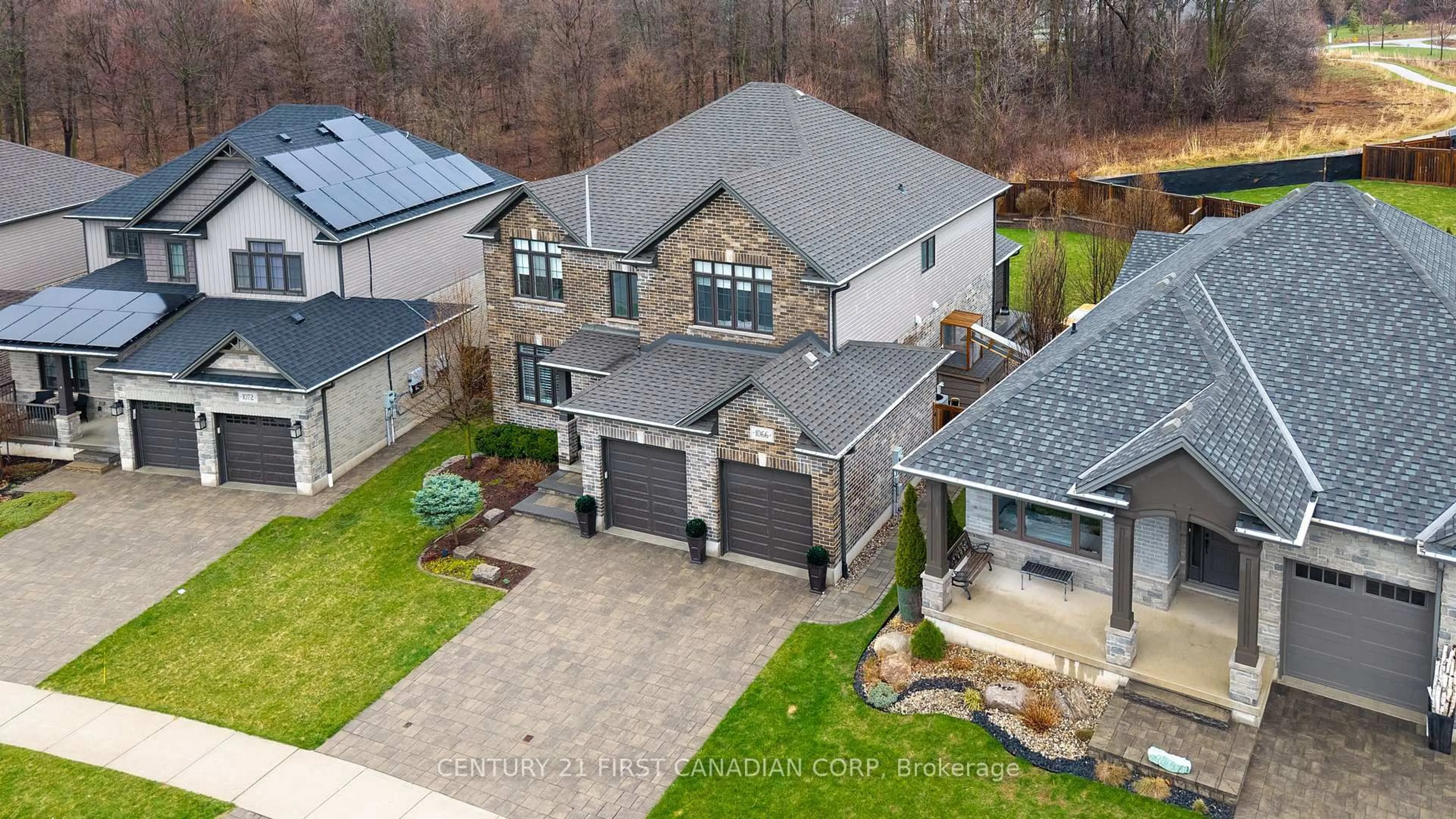 A pic from outside/outdoor area/front of a property/back of a property/a pic from drone, street for 1066 Riverbend Rd, London South Ontario N6K 4Z3