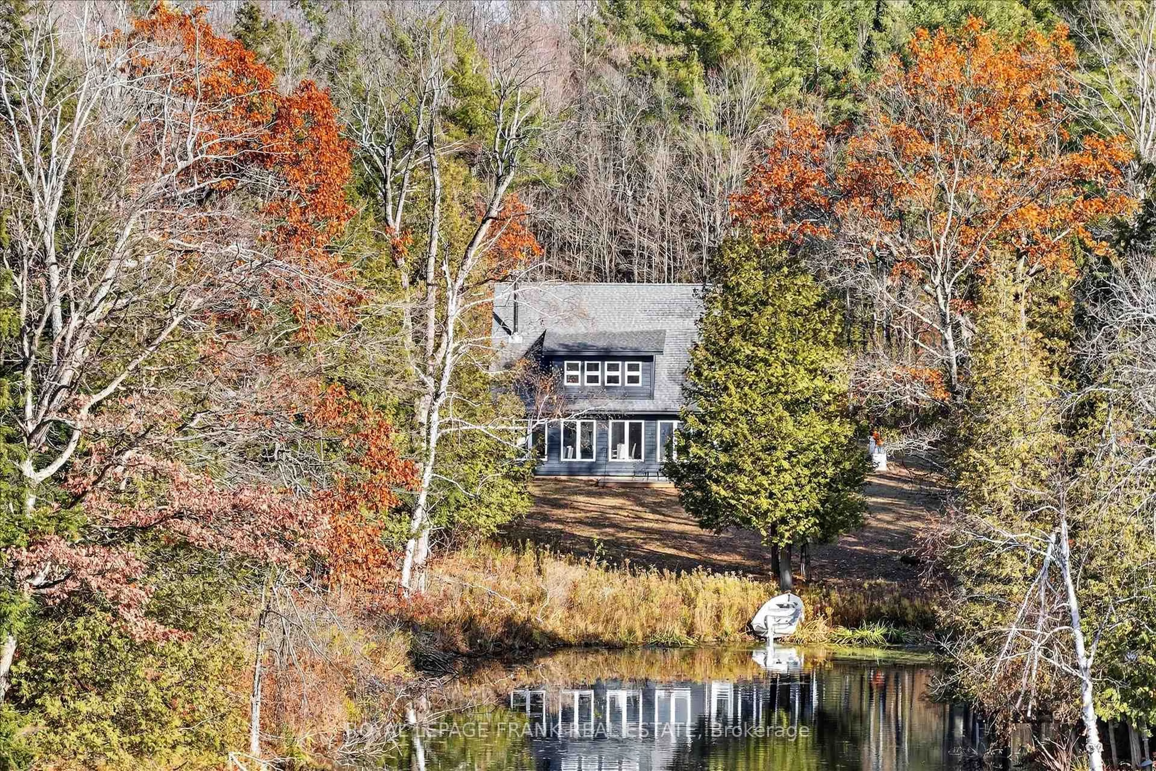 A pic from outside/outdoor area/front of a property/back of a property/a pic from drone, water/lake/river/ocean view for 299 Fire Route 10A, North Kawartha Ontario K0L 3G0