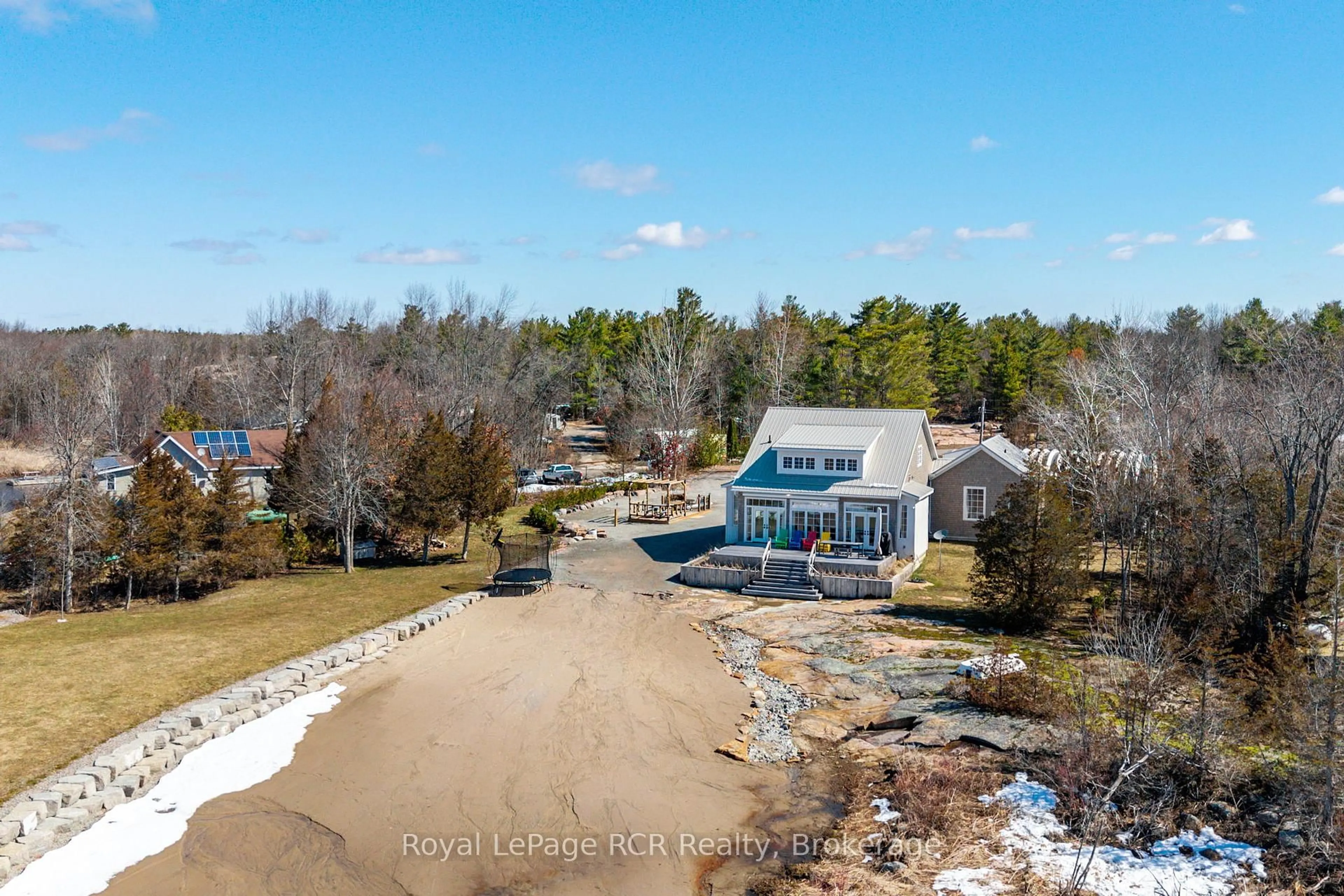 A pic from outside/outdoor area/front of a property/back of a property/a pic from drone, water/lake/river/ocean view for 101 Evergreen Lane, Georgian Bay Ontario L0K 1S0