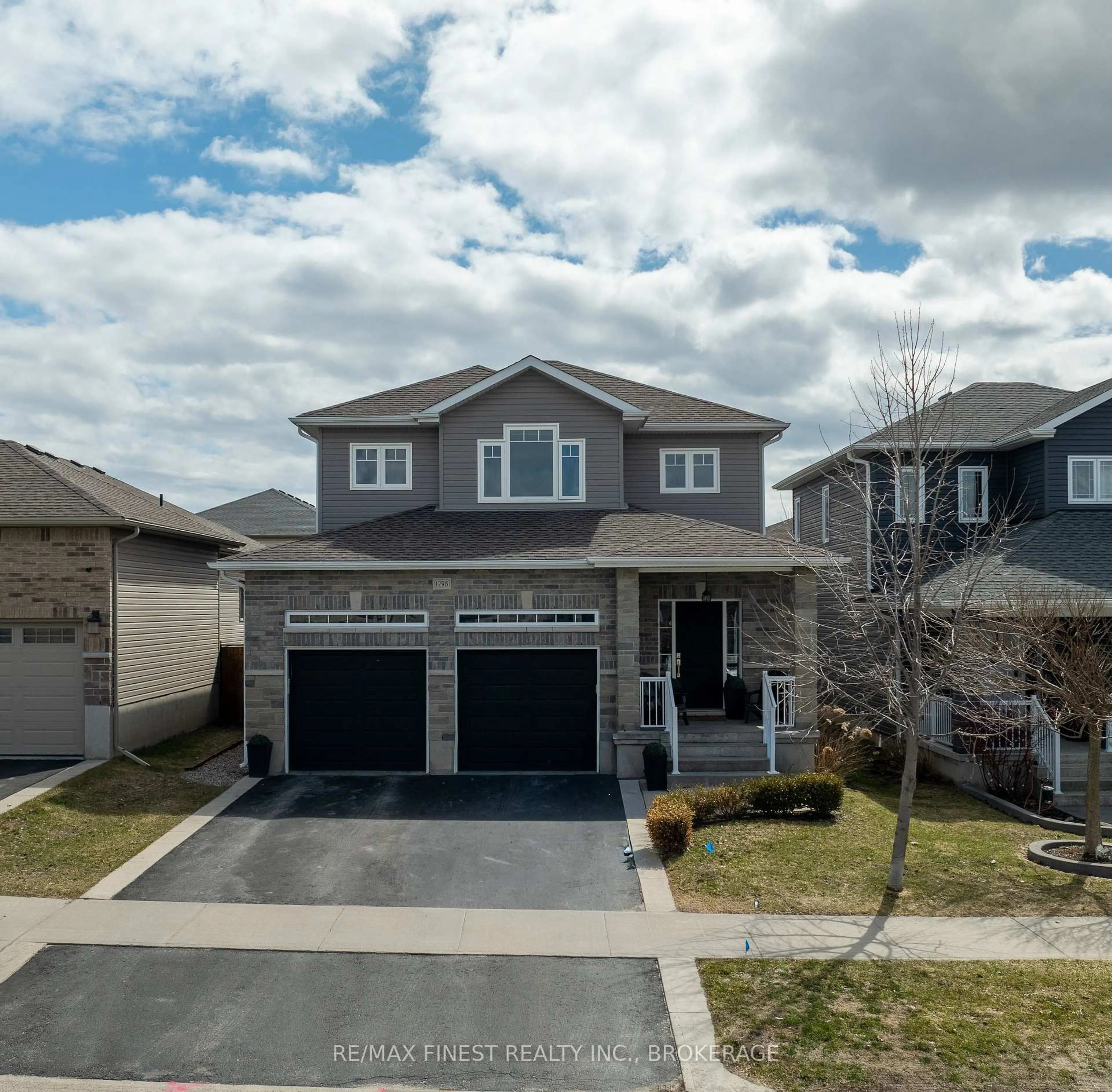 A pic from outside/outdoor area/front of a property/back of a property/a pic from drone, street for 1298 CARFA Cres, Kingston Ontario K7P 0M9