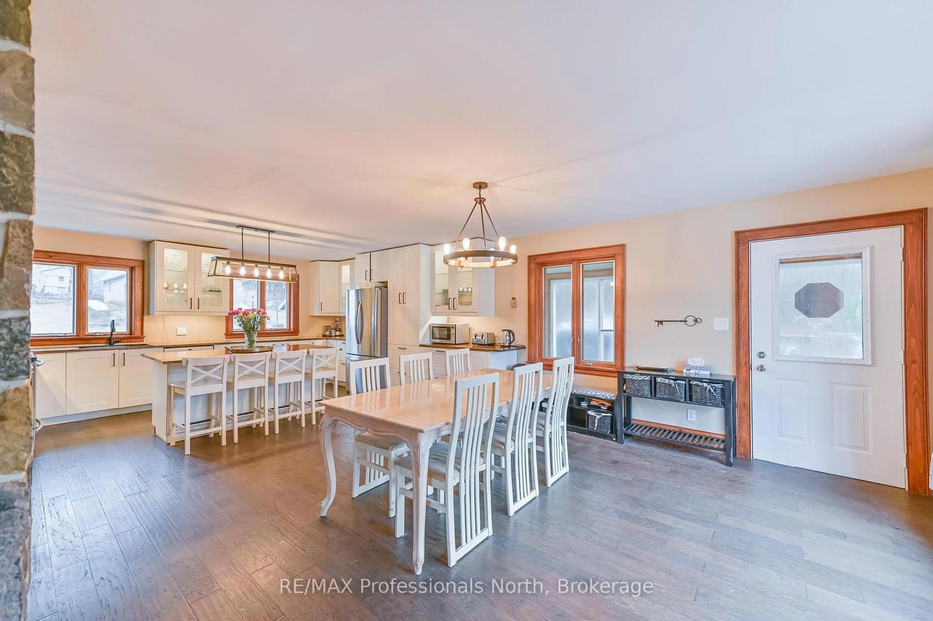 Open concept kitchen, wood/laminate floor for 2481 North Shore Rd, Algonquin Highlands Ontario K0M 1S0