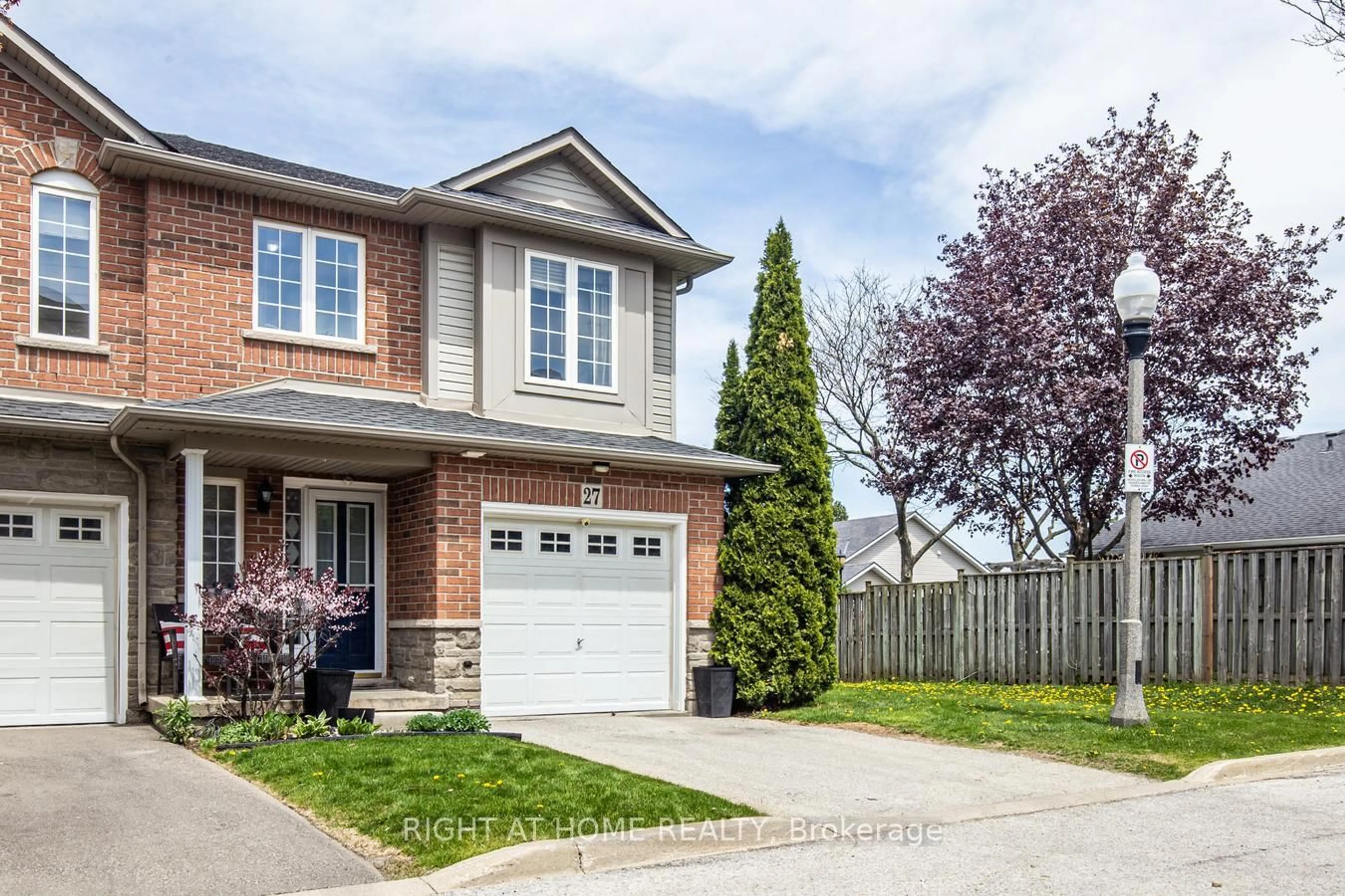 Home with brick exterior material, street for 7 Southside Pl #27, Hamilton Ontario L9C 7W6