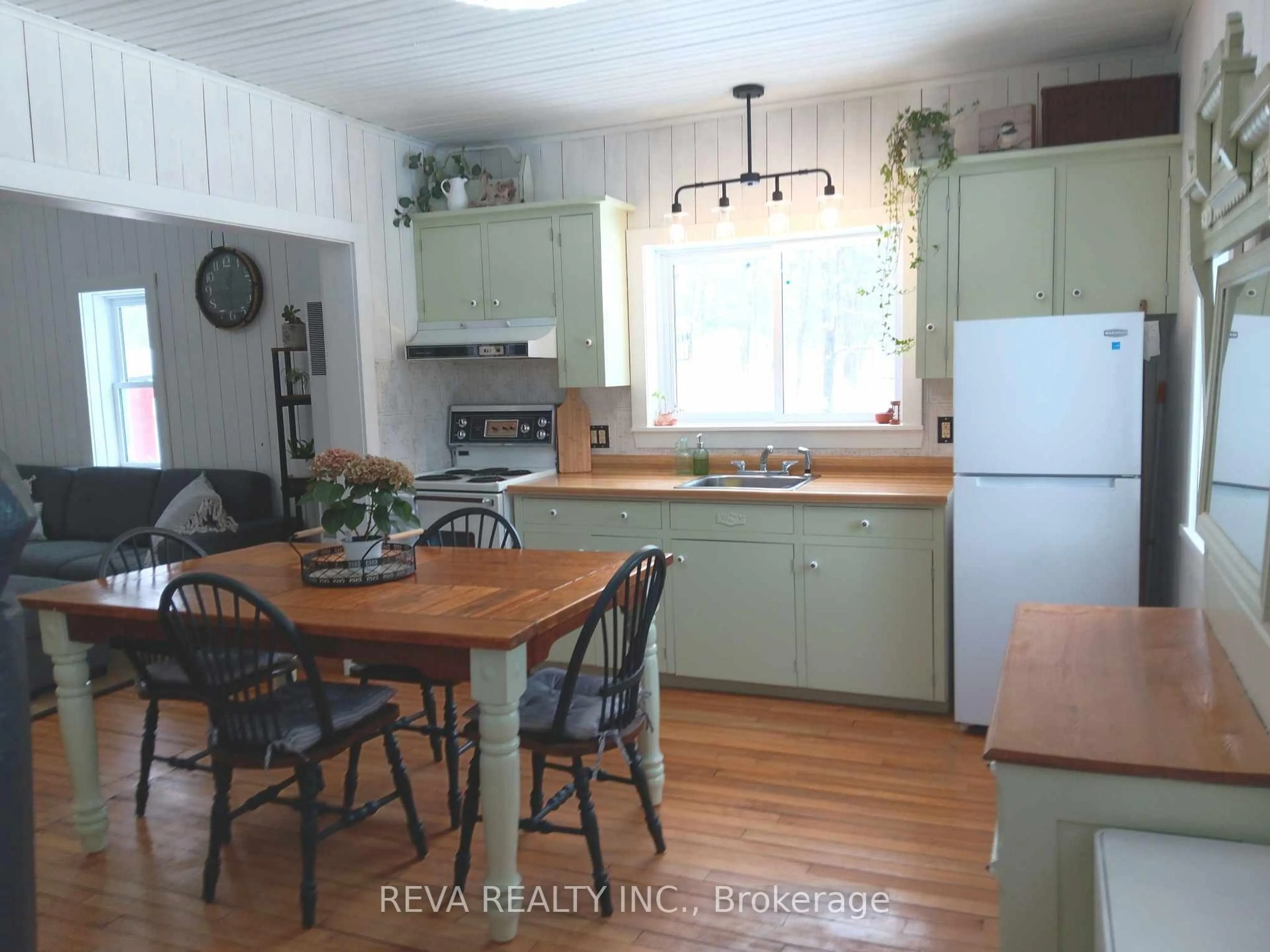 Open concept kitchen, wood/laminate floor for 1476 Hillsview Rd, Maple Leaf Ontario K0L 2R0