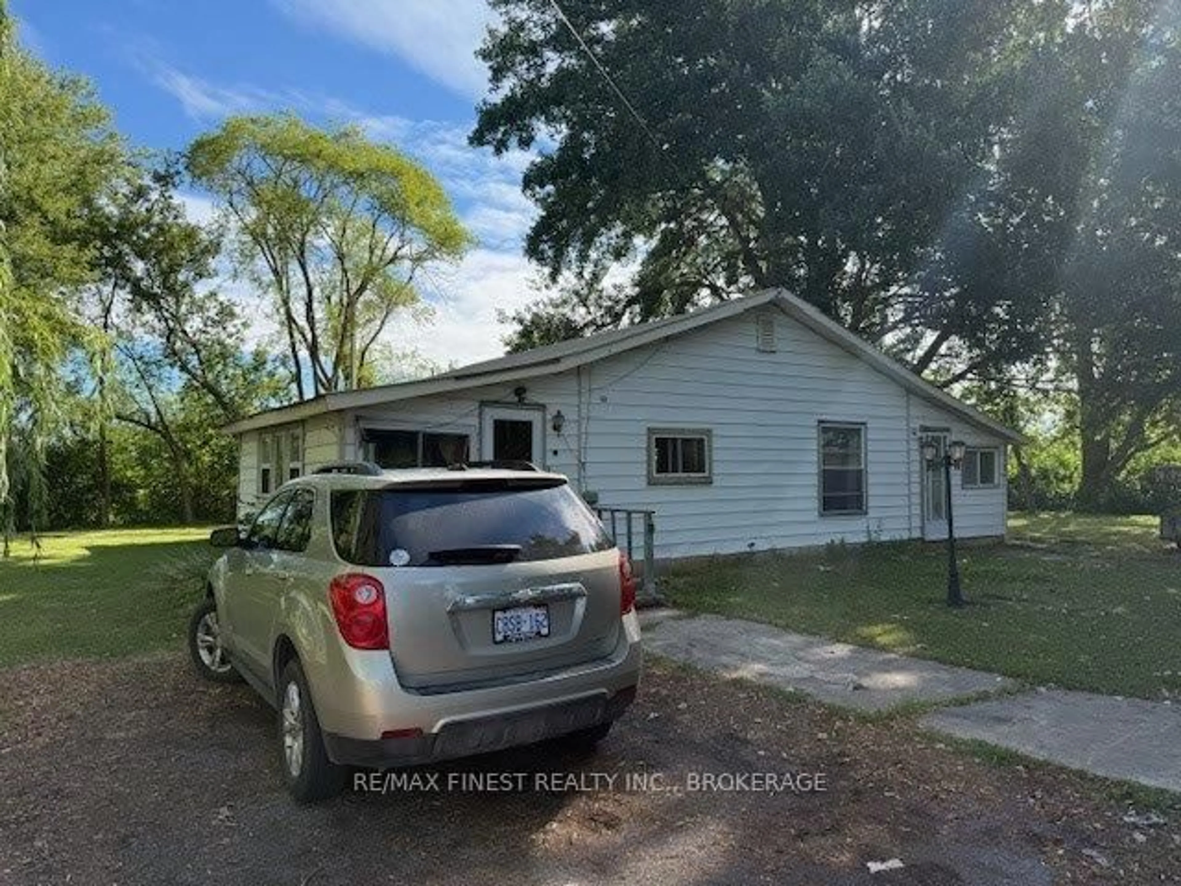 A pic from outside/outdoor area/front of a property/back of a property/a pic from drone, street for 1623 Road 96, Wolfe Island Ontario K0H 2Y0