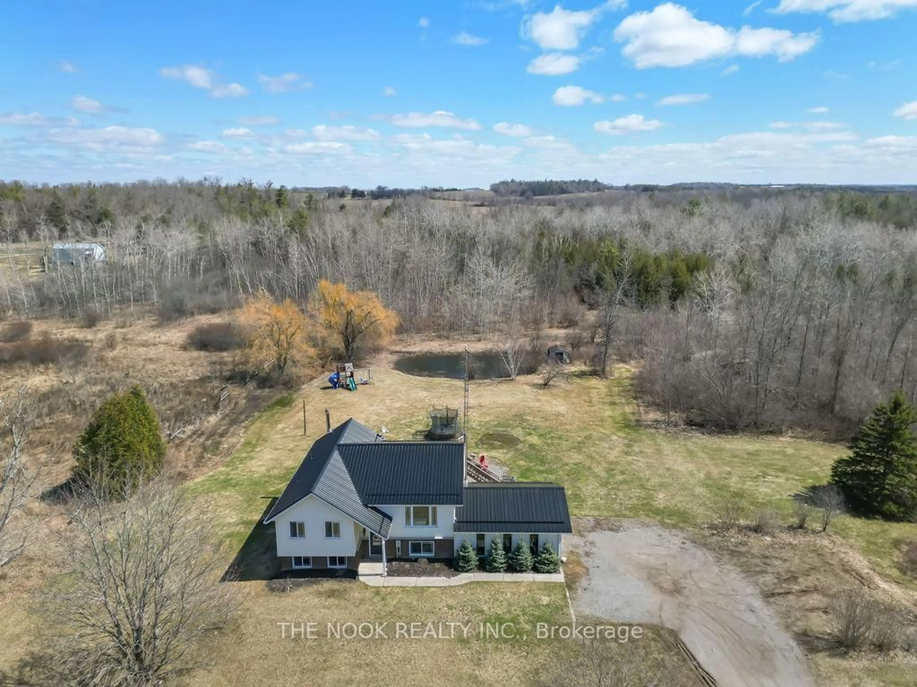 A pic from outside/outdoor area/front of a property/back of a property/a pic from drone, water/lake/river/ocean view for 1915 County Road 2 Rd, Otonabee-South Monaghan Ontario K9J 6X7