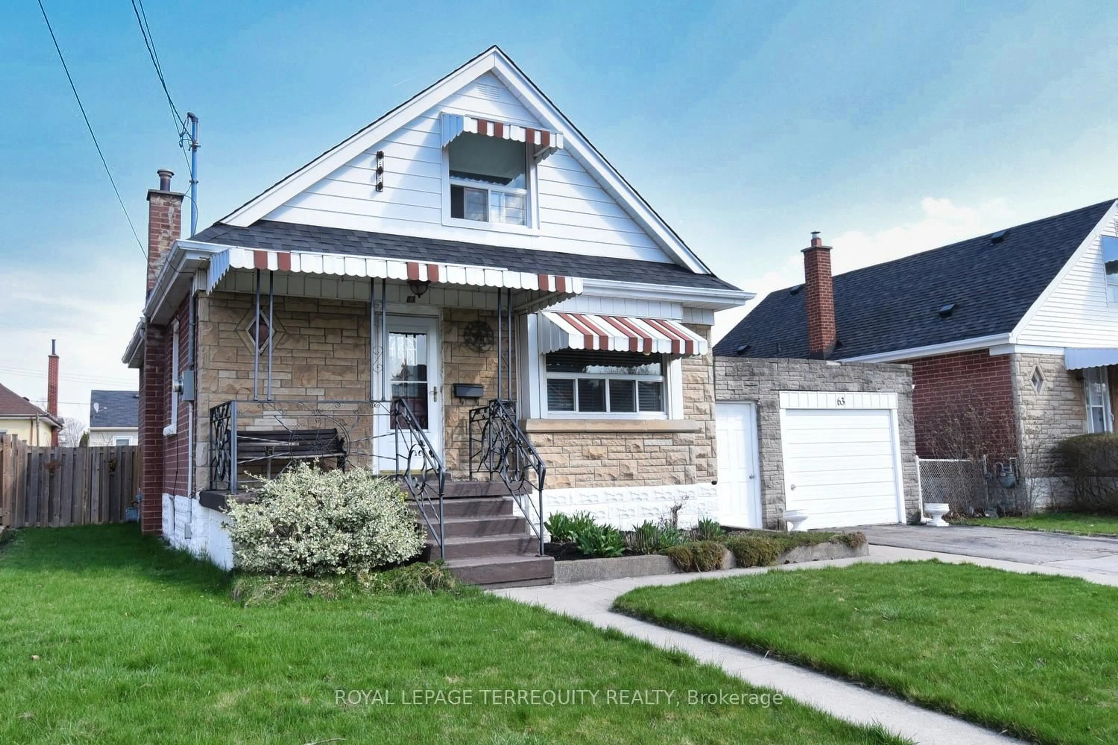 Home with brick exterior material, street for 63 West 1st St, Hamilton Ontario L9C 3C2