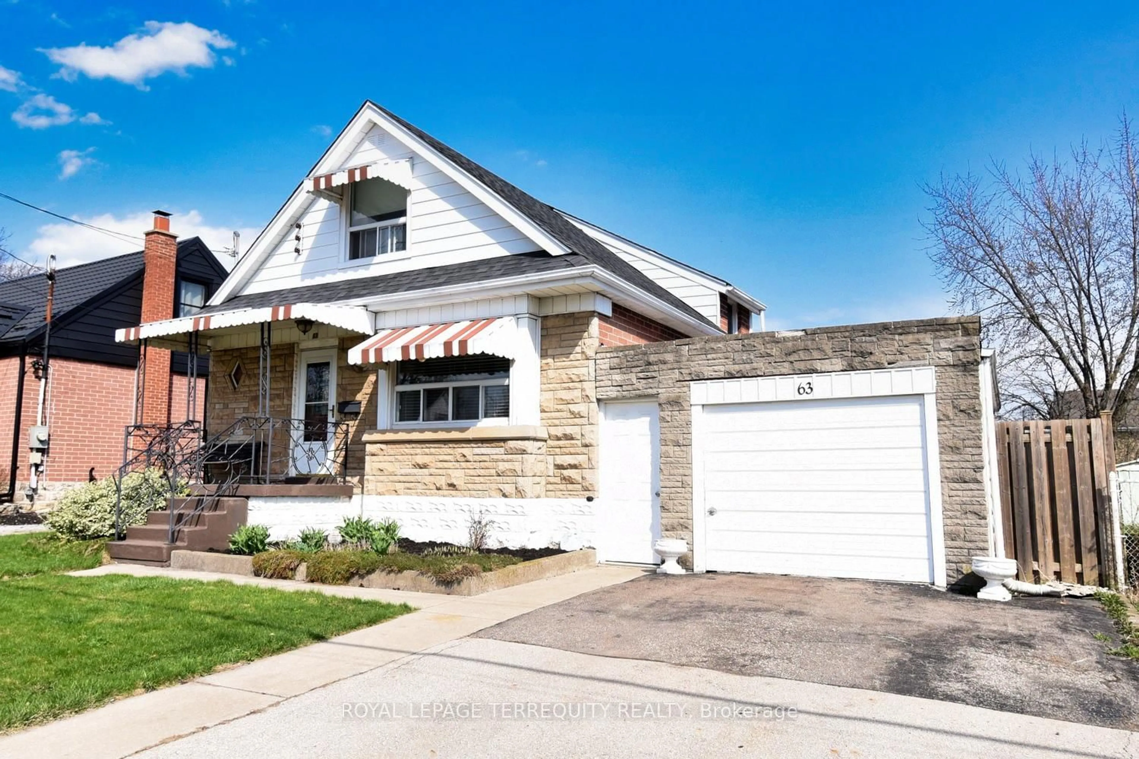 Home with brick exterior material, street for 63 West 1st St, Hamilton Ontario L9C 3C2