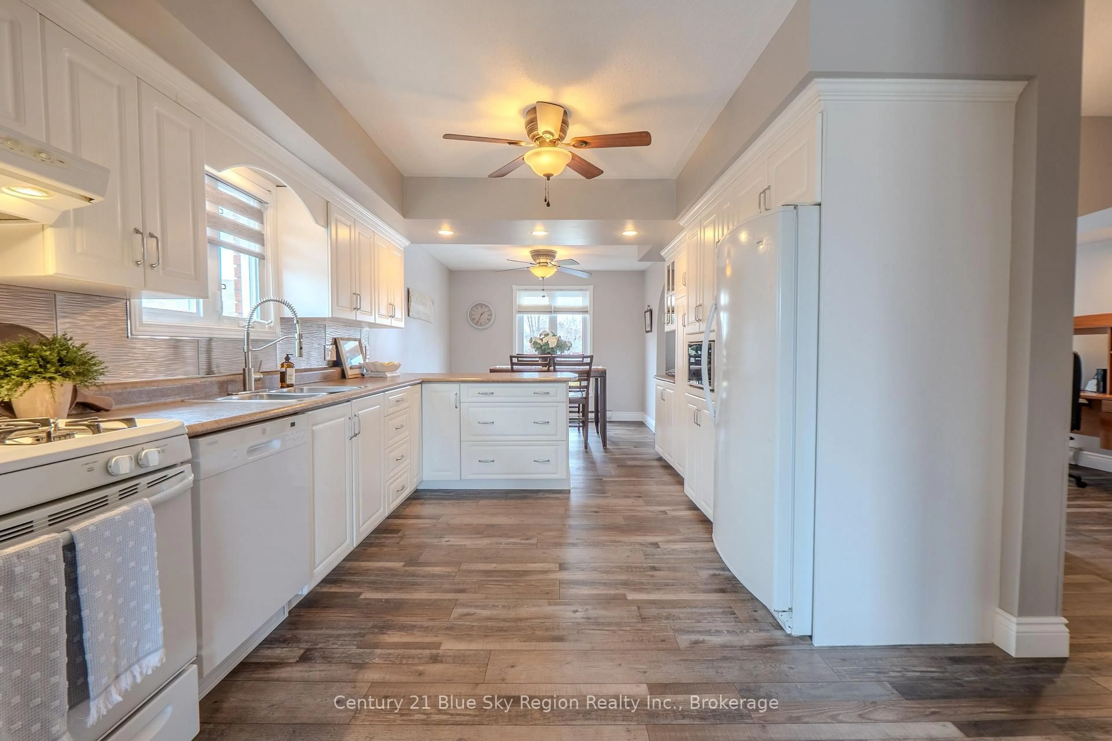 Open concept kitchen, ceramic/tile floor for 35 Chateau Terr, West Nipissing Ontario P2B 1X6