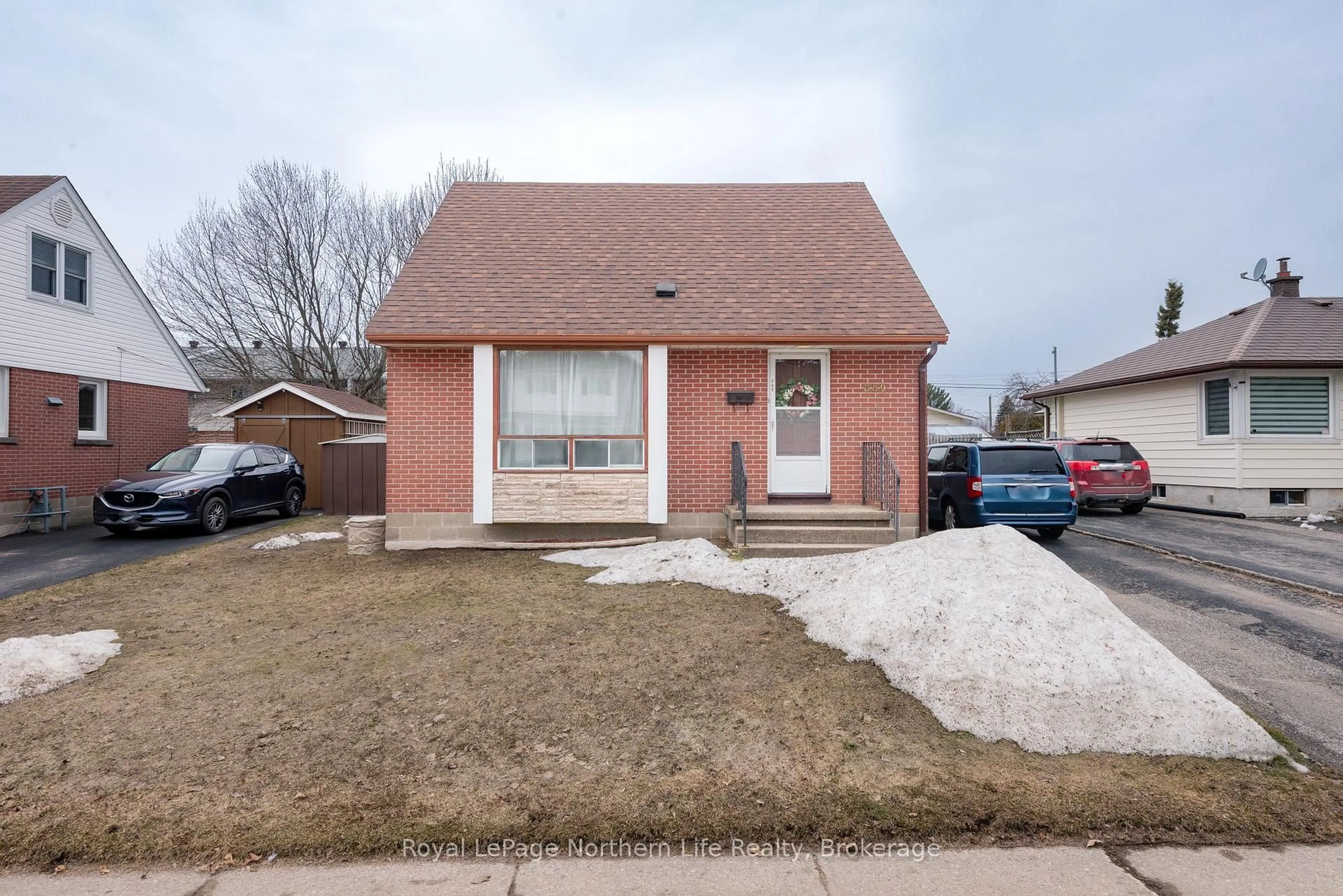 Home with brick exterior material, street for 889 Phillip St, North Bay Ontario P1B 3V6