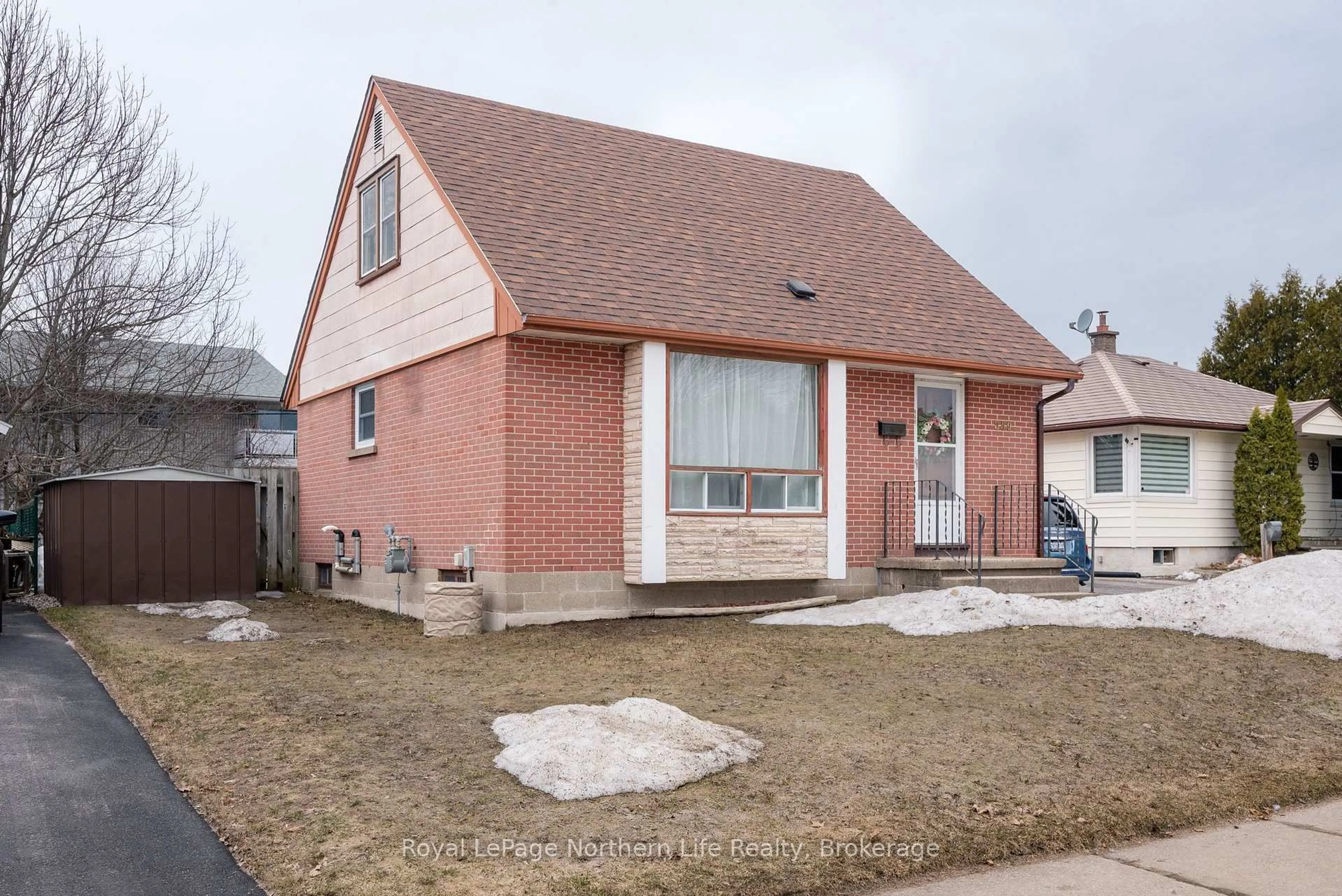 Home with brick exterior material, street for 889 Phillip St, North Bay Ontario P1B 3V6