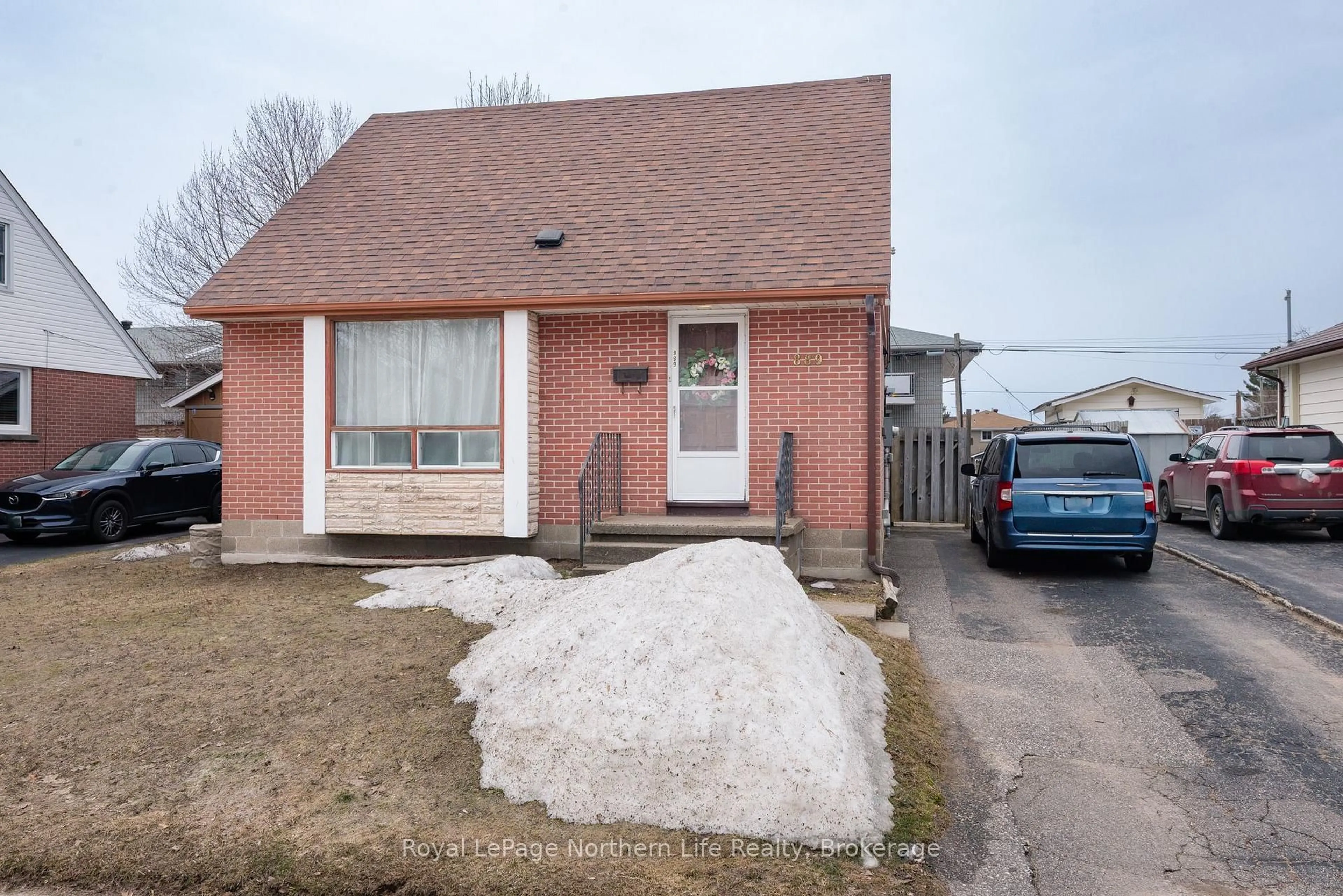Home with brick exterior material, street for 889 Phillip St, North Bay Ontario P1B 3V6