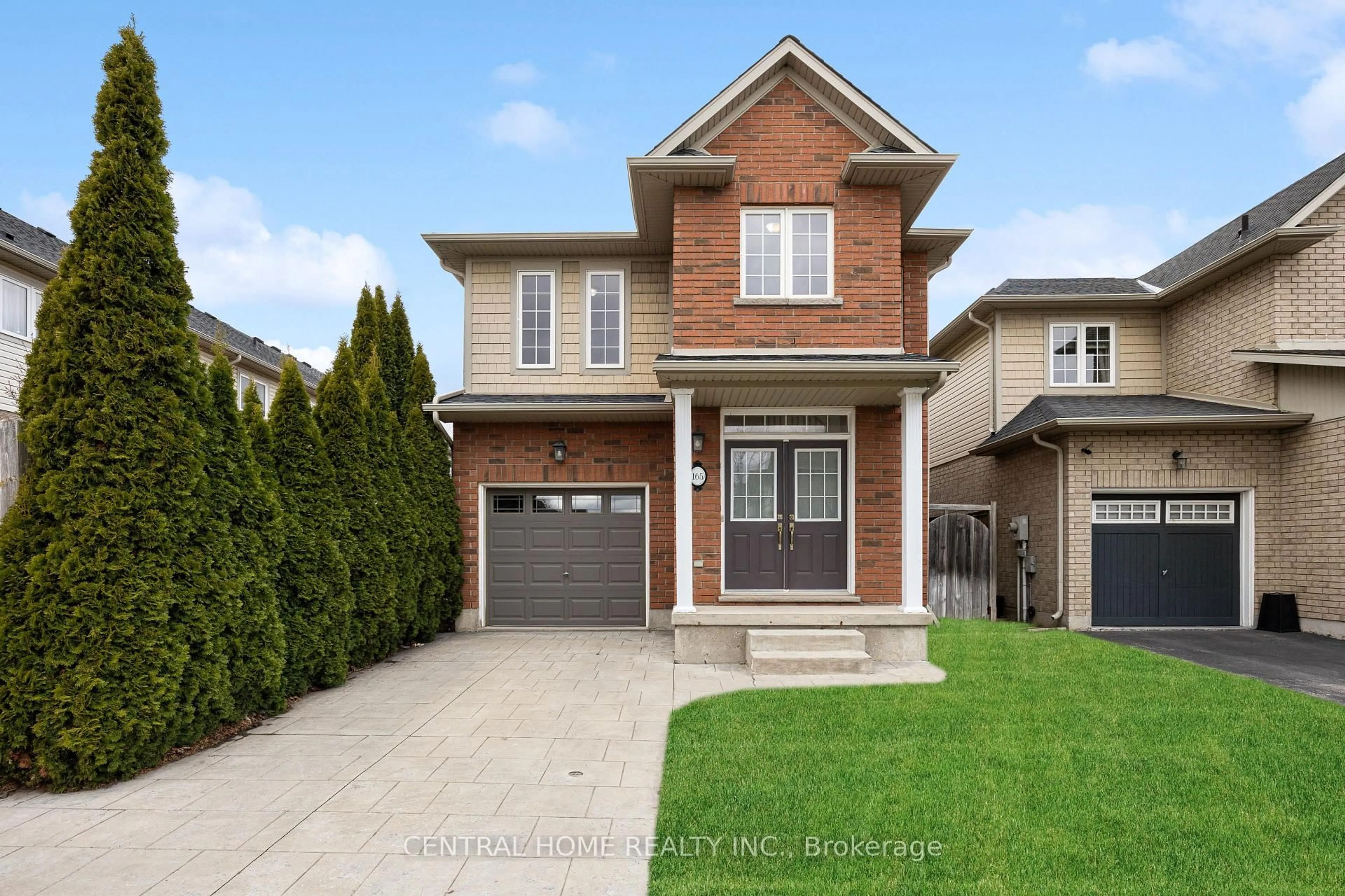 Home with brick exterior material, street for 165 Palacebeach Tr, Hamilton Ontario L8E 0C3