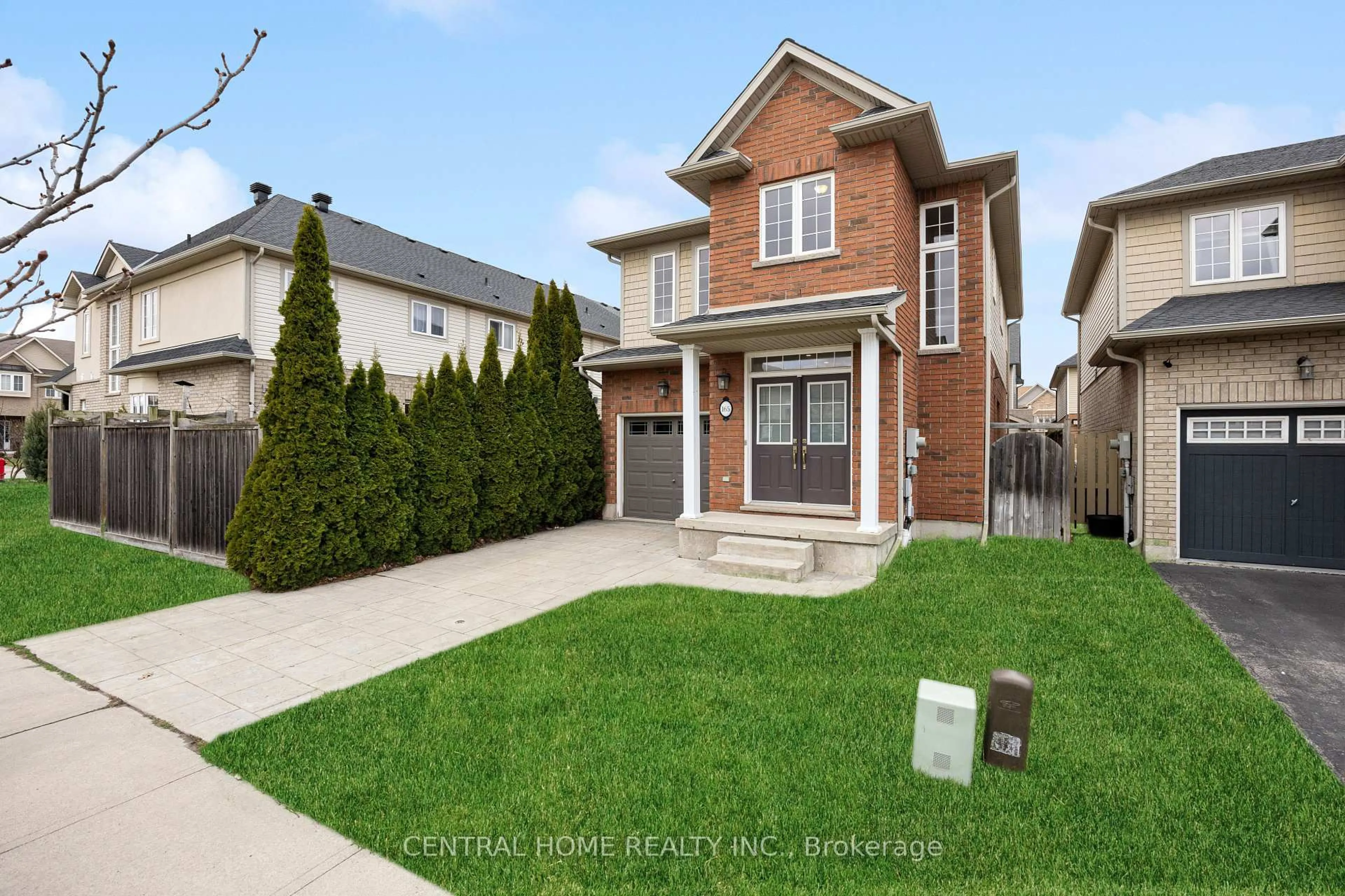 Home with brick exterior material, street for 165 Palacebeach Tr, Hamilton Ontario L8E 0C3