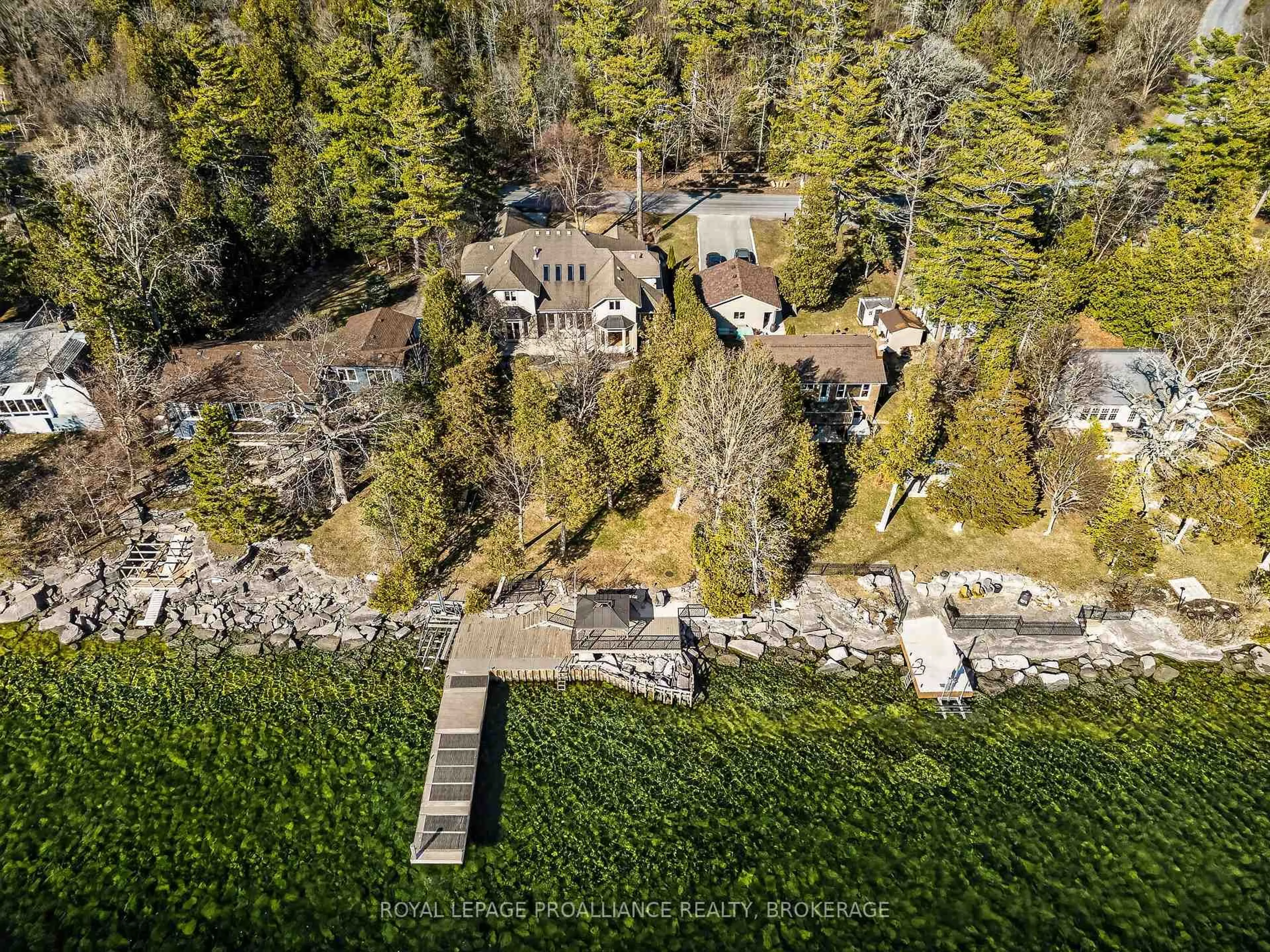 A pic from outside/outdoor area/front of a property/back of a property/a pic from drone, forest/trees view for 178 Nicholson Point Rd, Bath Ontario K0H 1G0