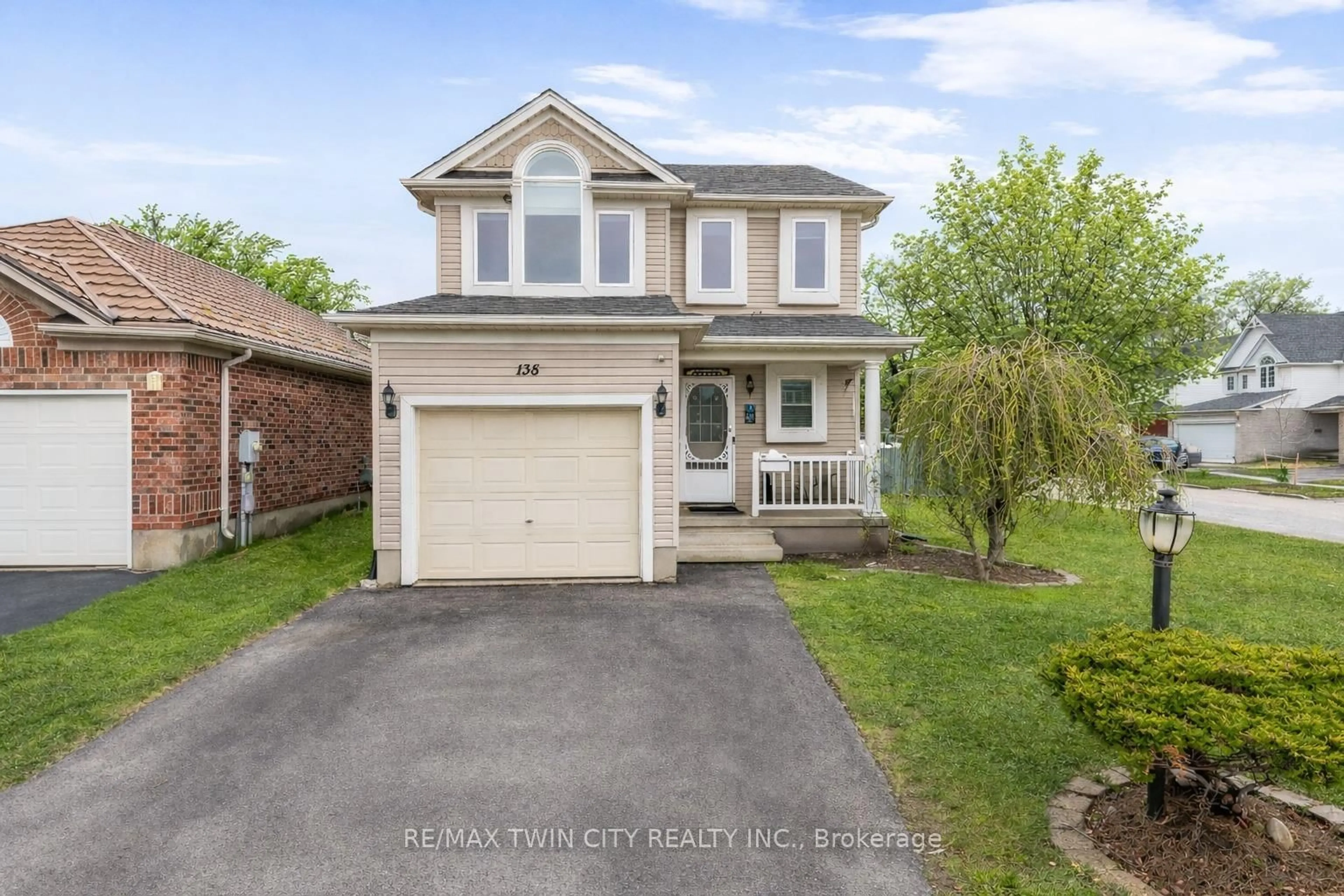 Home with vinyl exterior material, street for 135 Veronica Dr, Kitchener Ontario N2A 4E6