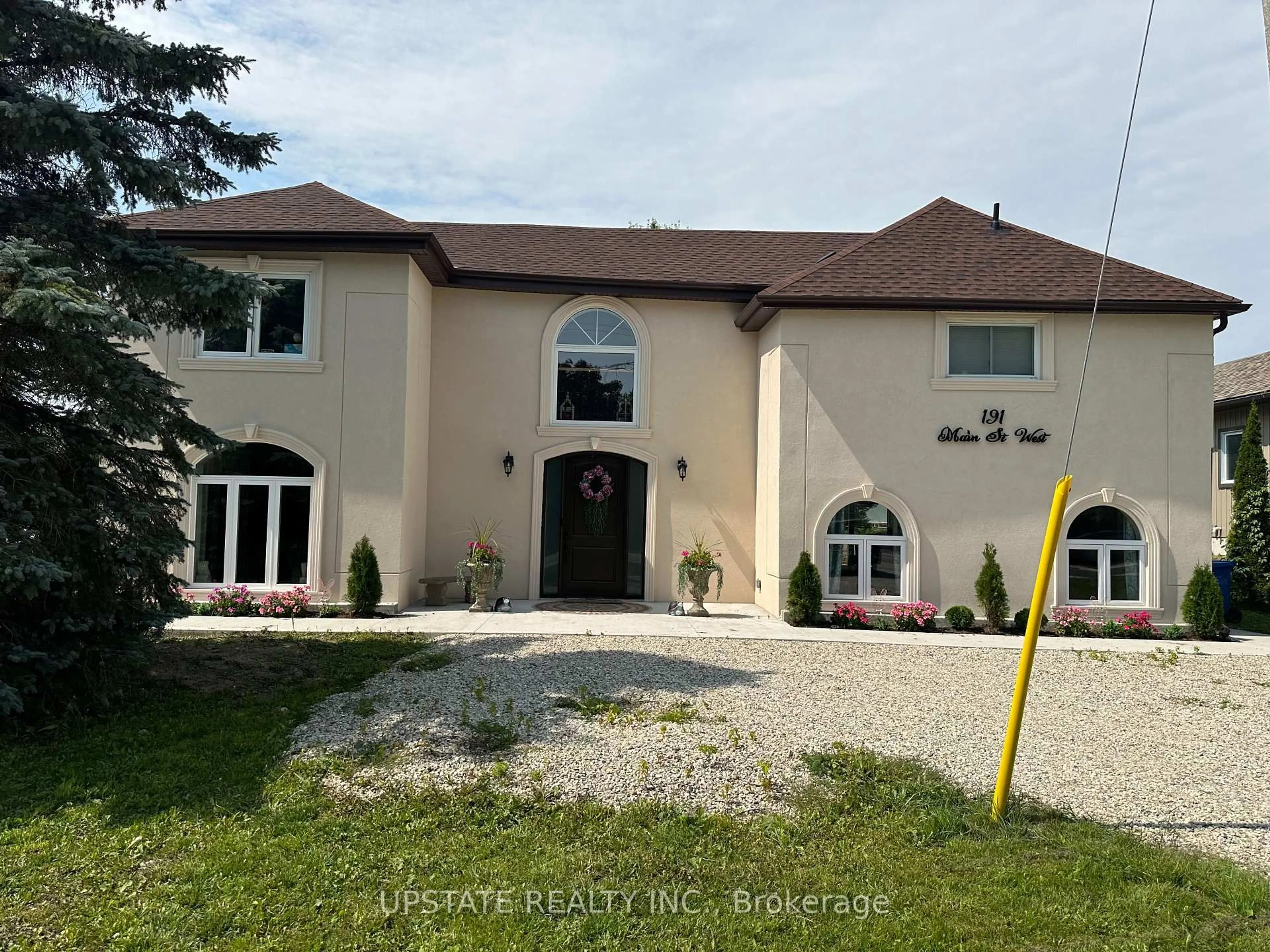 A pic from outside/outdoor area/front of a property/back of a property/a pic from drone, unknown for 191 Main St, Southgate Ontario N0C 1B0