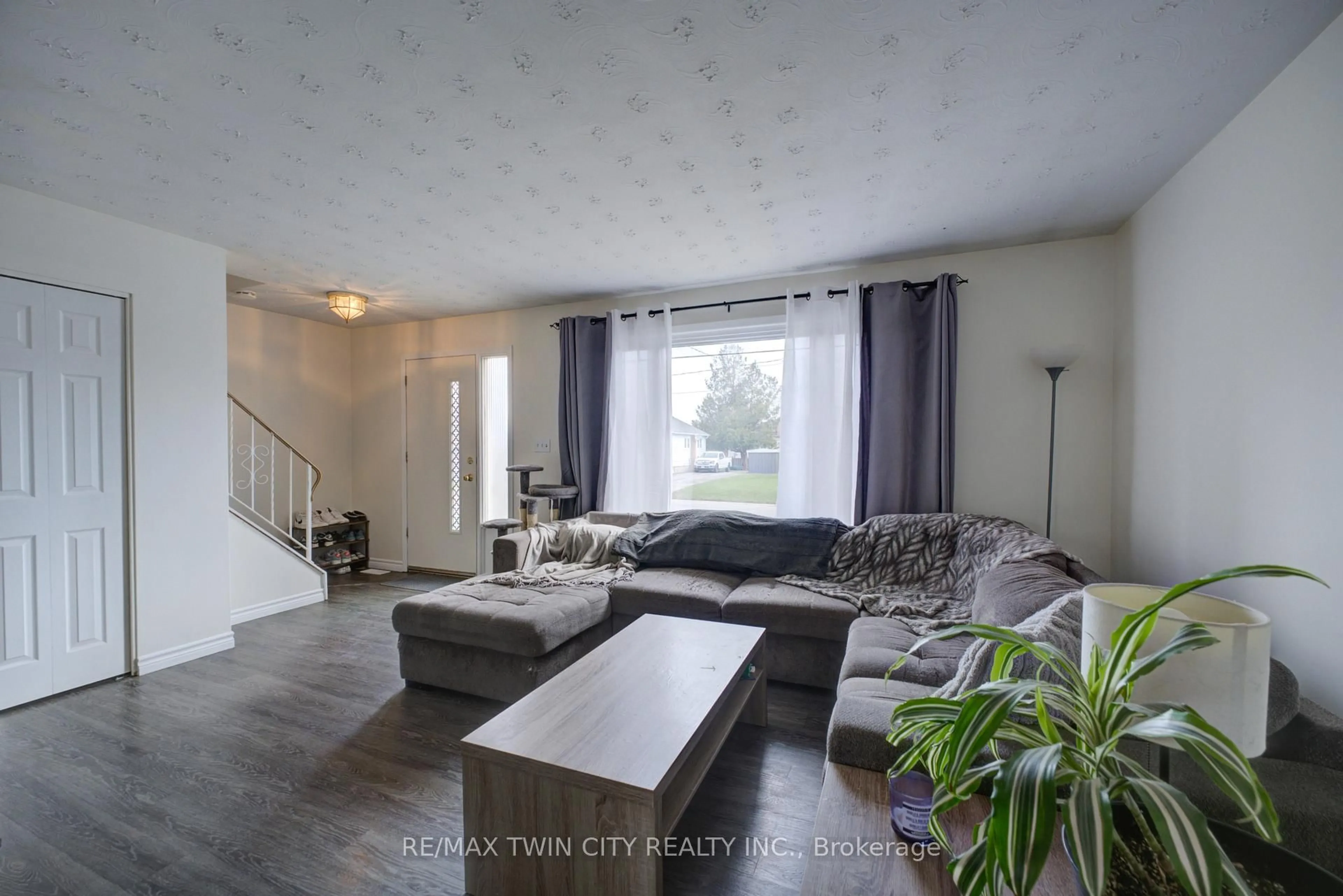 Living room with furniture, unknown for 32 Morley Ave #B, Brantford Ontario N3S 7A9