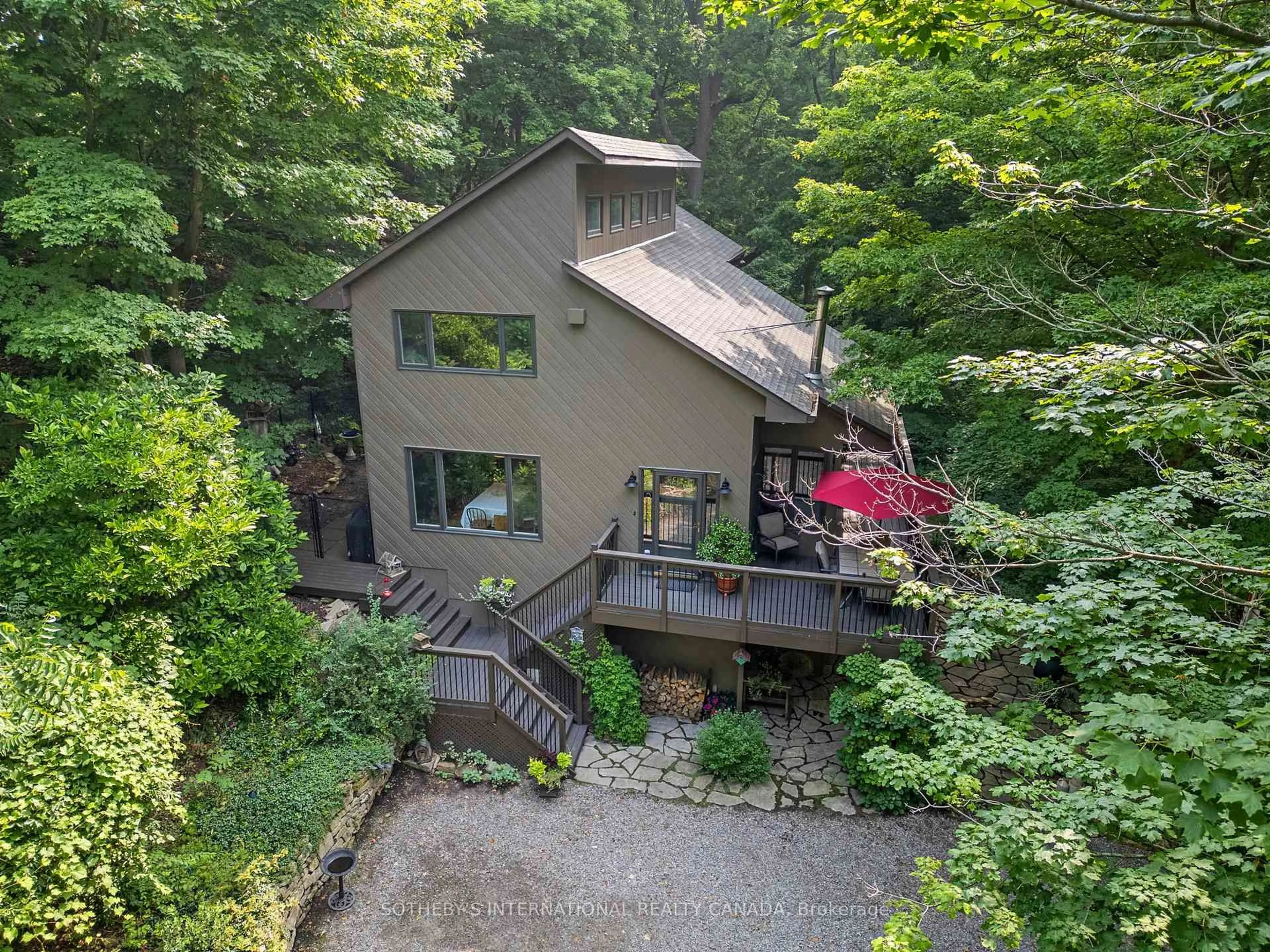 A pic from outside/outdoor area/front of a property/back of a property/a pic from drone, forest/trees view for 141 Valley Rd, Hamilton Ontario L9H 5E2