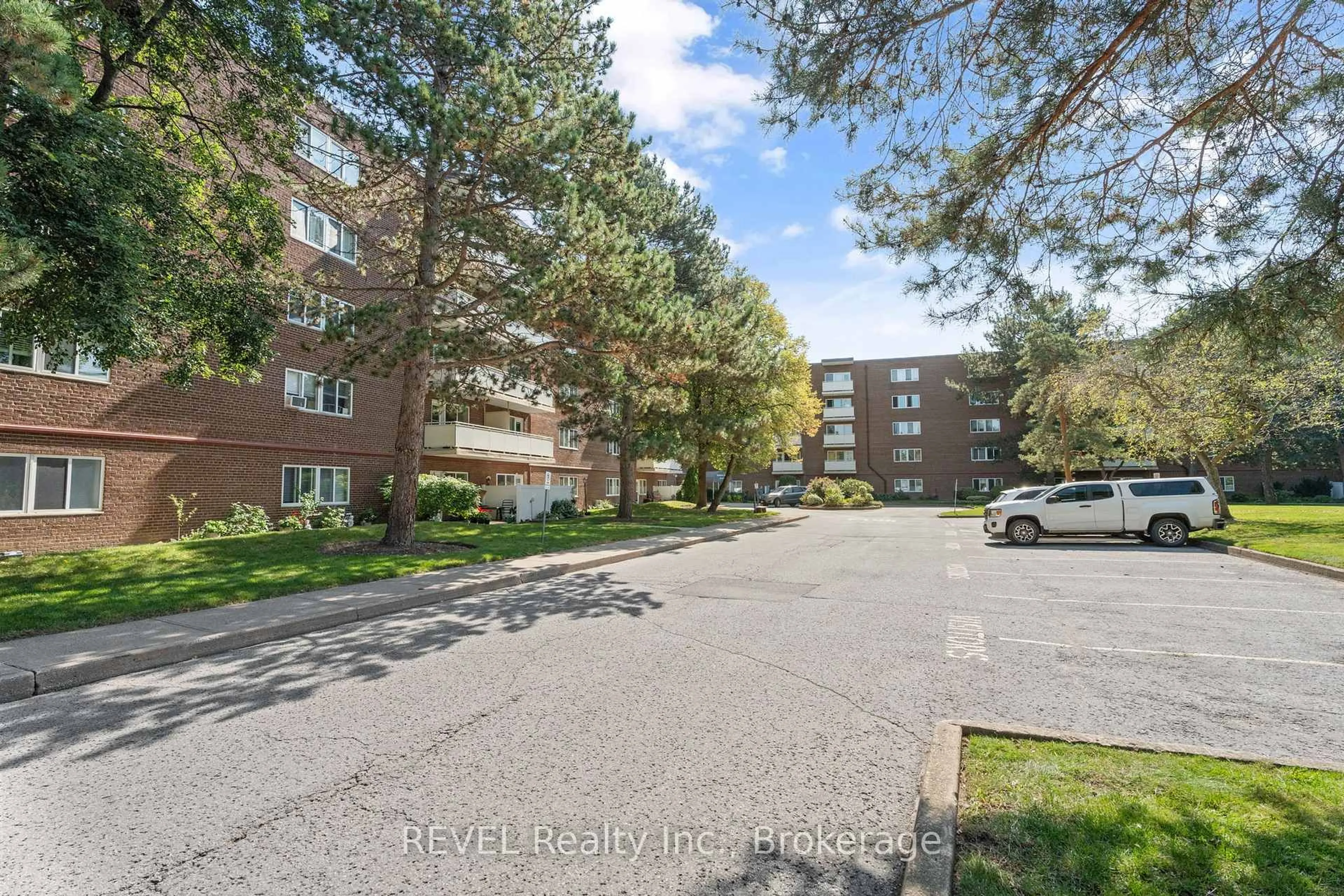 A pic from outside/outdoor area/front of a property/back of a property/a pic from drone, street for 198 Scott St #304, St. Catharines Ontario L2N 5T3