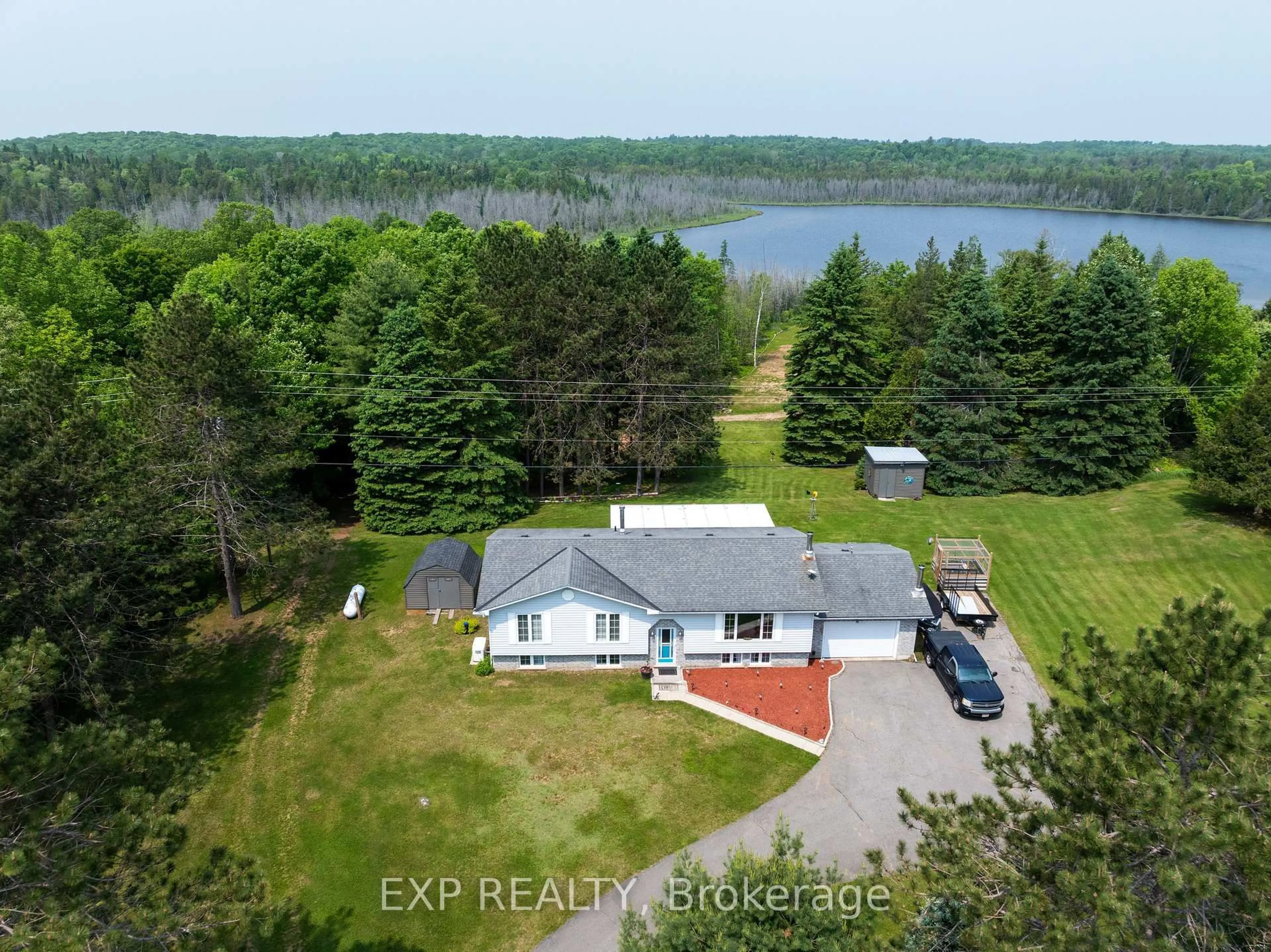 A pic from outside/outdoor area/front of a property/back of a property/a pic from drone, water/lake/river/ocean view for 1719 Weslemkoon Lake Rd, Bancroft Ontario K0L 1C0