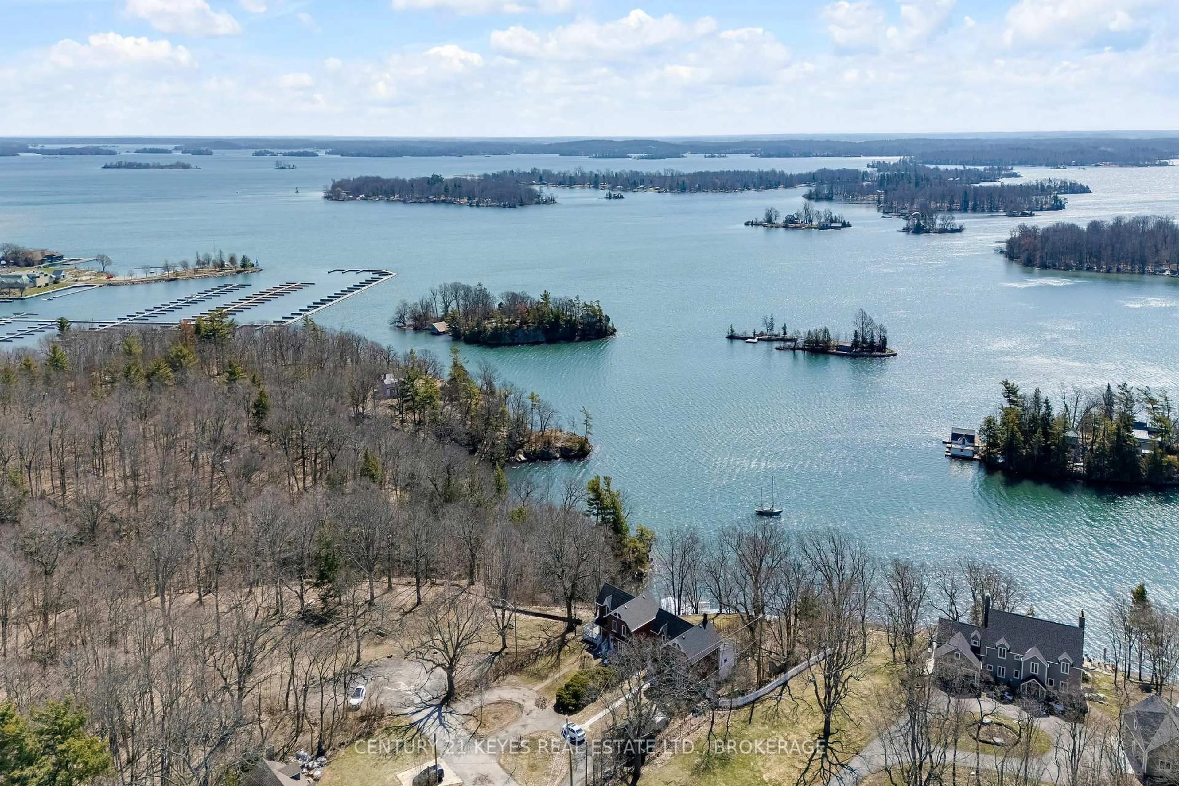 A pic from outside/outdoor area/front of a property/back of a property/a pic from drone, water/lake/river/ocean view for 13 Windsor Dr, Gananoque Ontario K7G 2C9