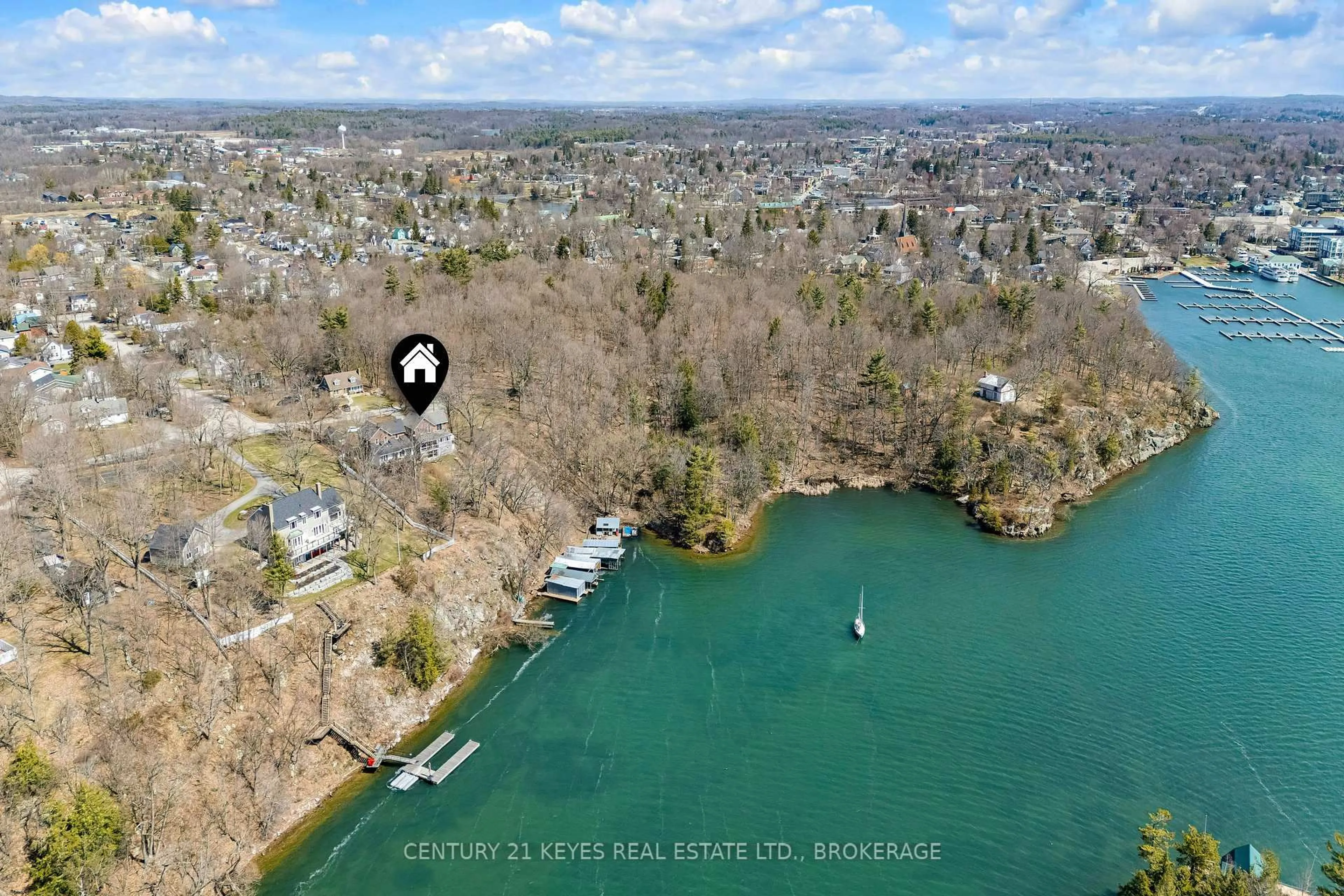 A pic from outside/outdoor area/front of a property/back of a property/a pic from drone, water/lake/river/ocean view for 13 Windsor Dr, Gananoque Ontario K7G 2C9