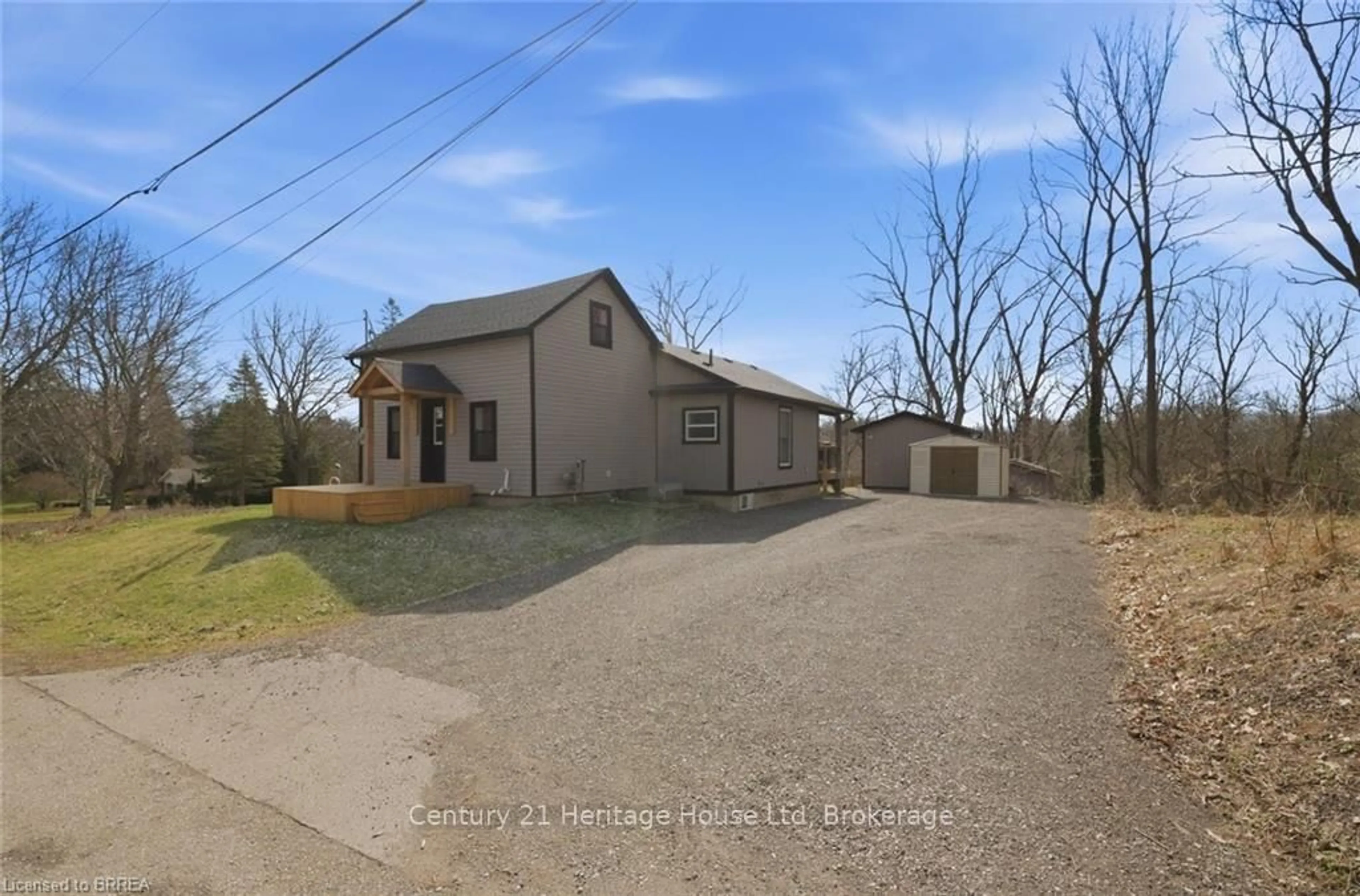 A pic from outside/outdoor area/front of a property/back of a property/a pic from drone, street for 11 Malcolm St, Brant Ontario N0E 1L0