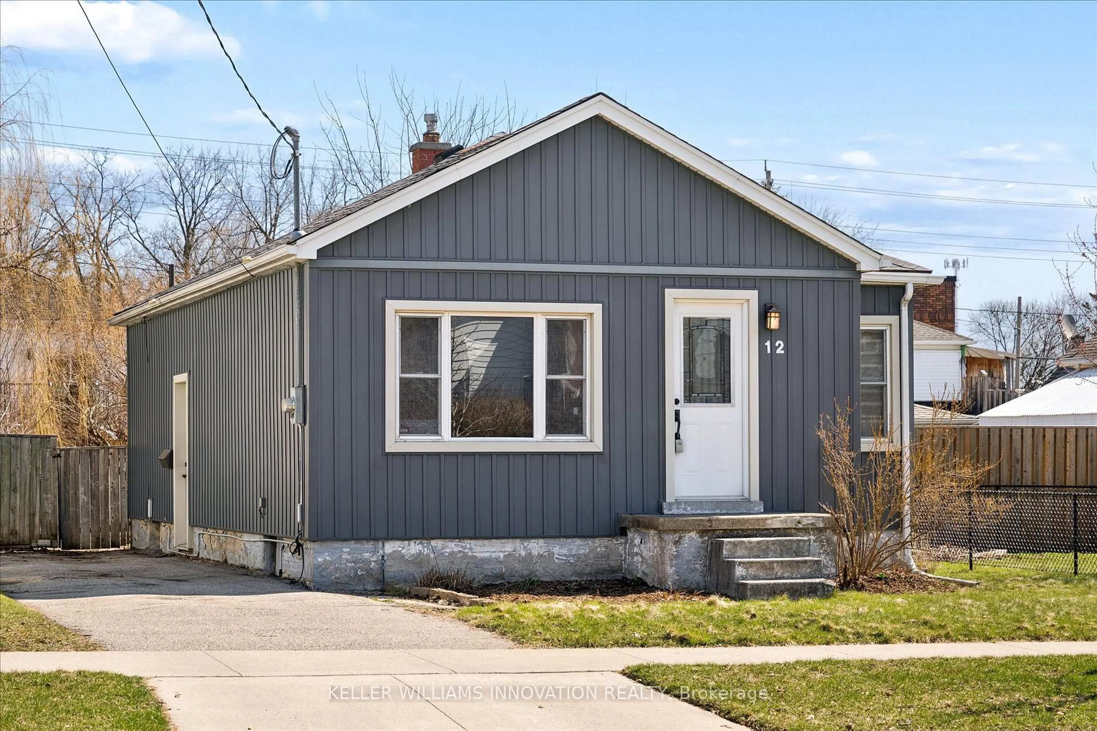Home with vinyl exterior material, street for 12 St Vincent St, Kitchener Ontario N2H 4R2