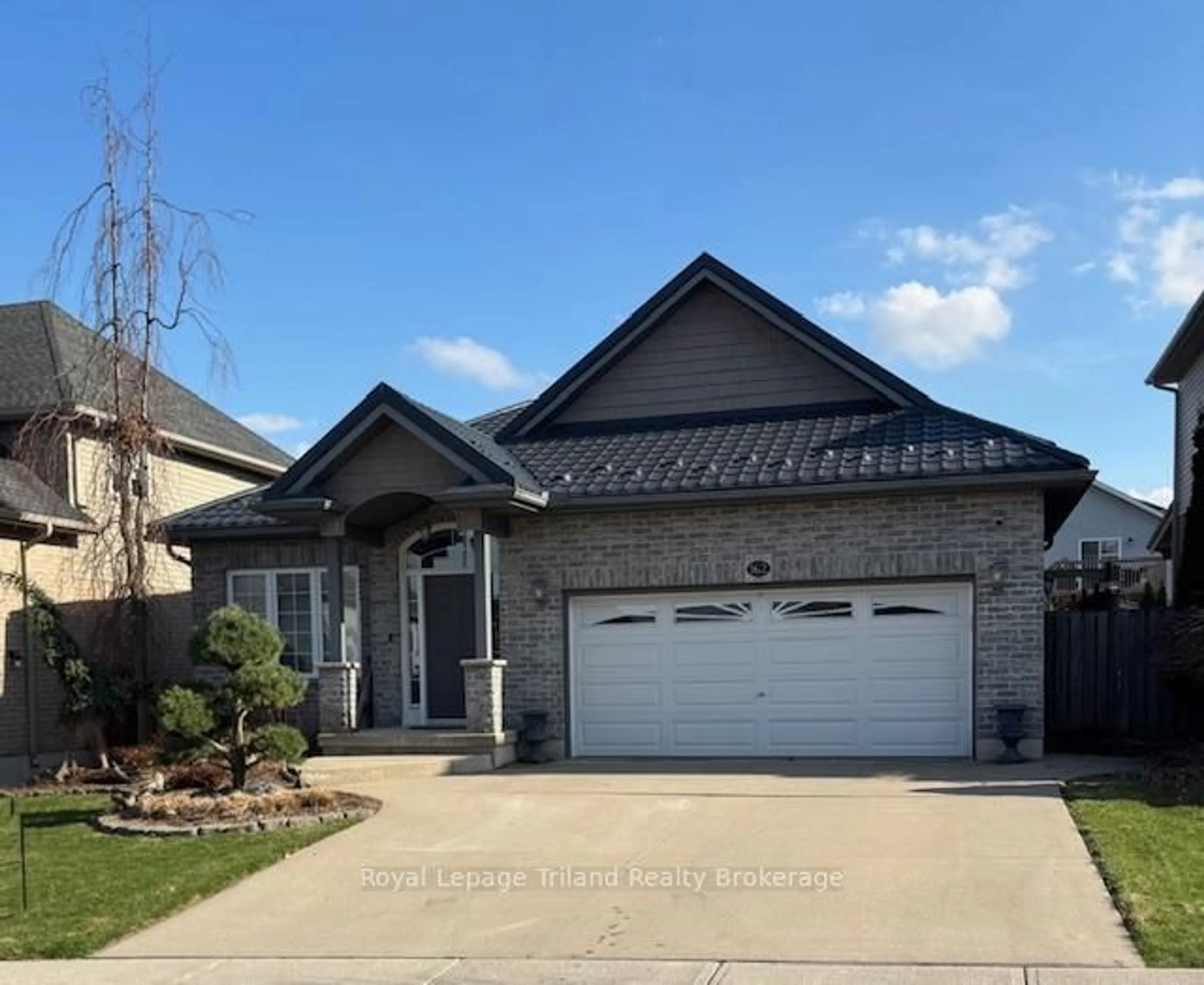 Home with brick exterior material, street for 162 Forestway Tr, Woodstock Ontario N4S 9A7