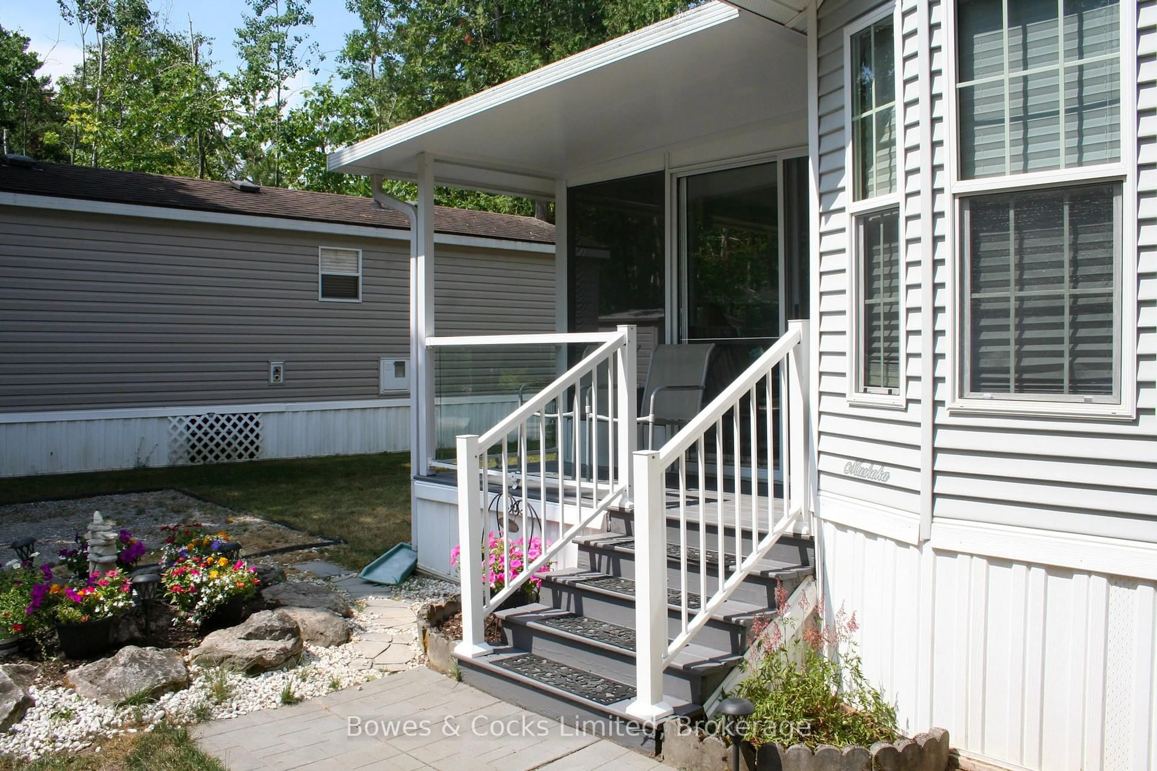 Home with vinyl exterior material, street for 2 Rockhaven-Pioneer Pt, Selwyn Ontario K0L 2H0