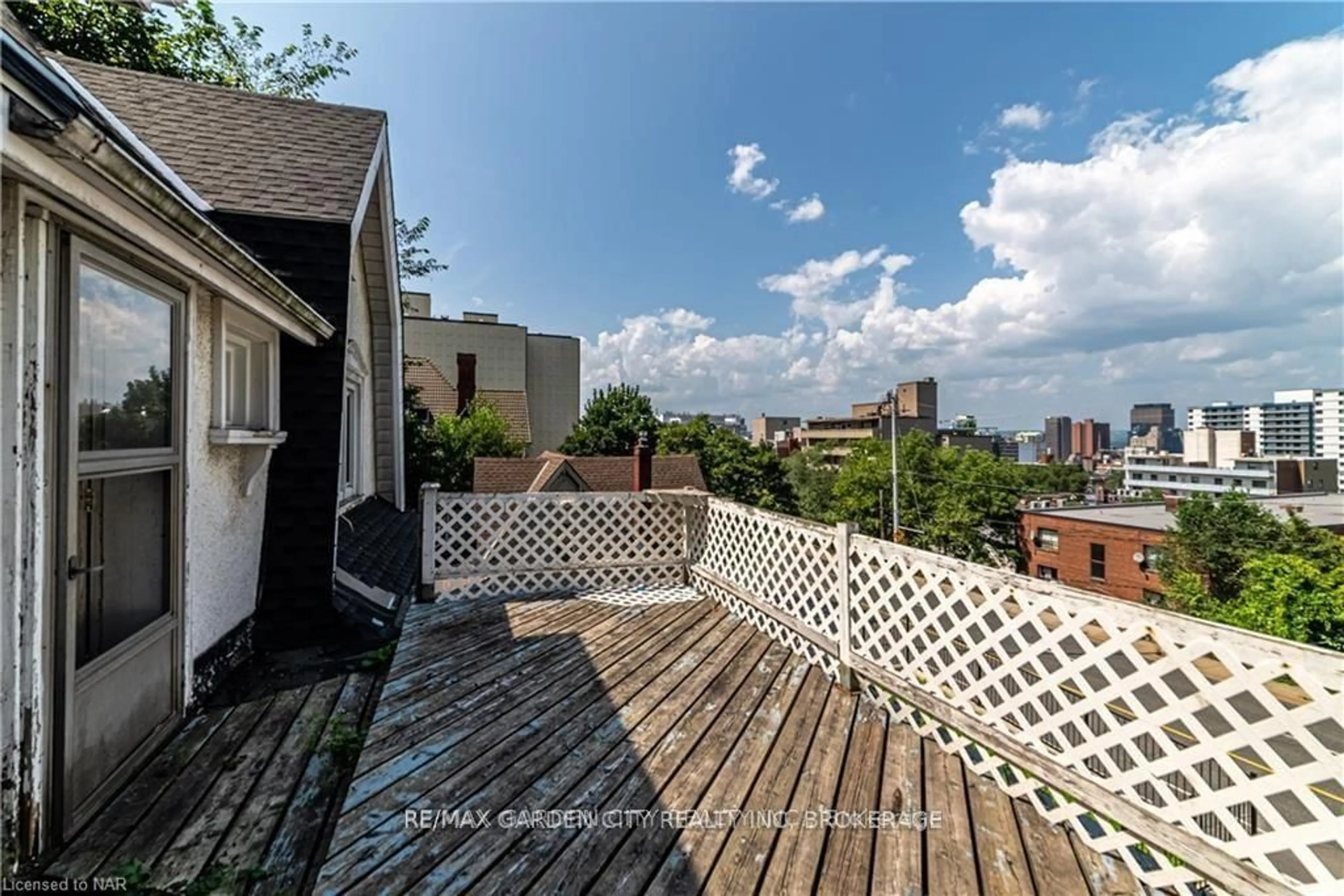 Patio, city buildings view from balcony for 68 Arkledun Ave, Hamilton Ontario L8N 2H8