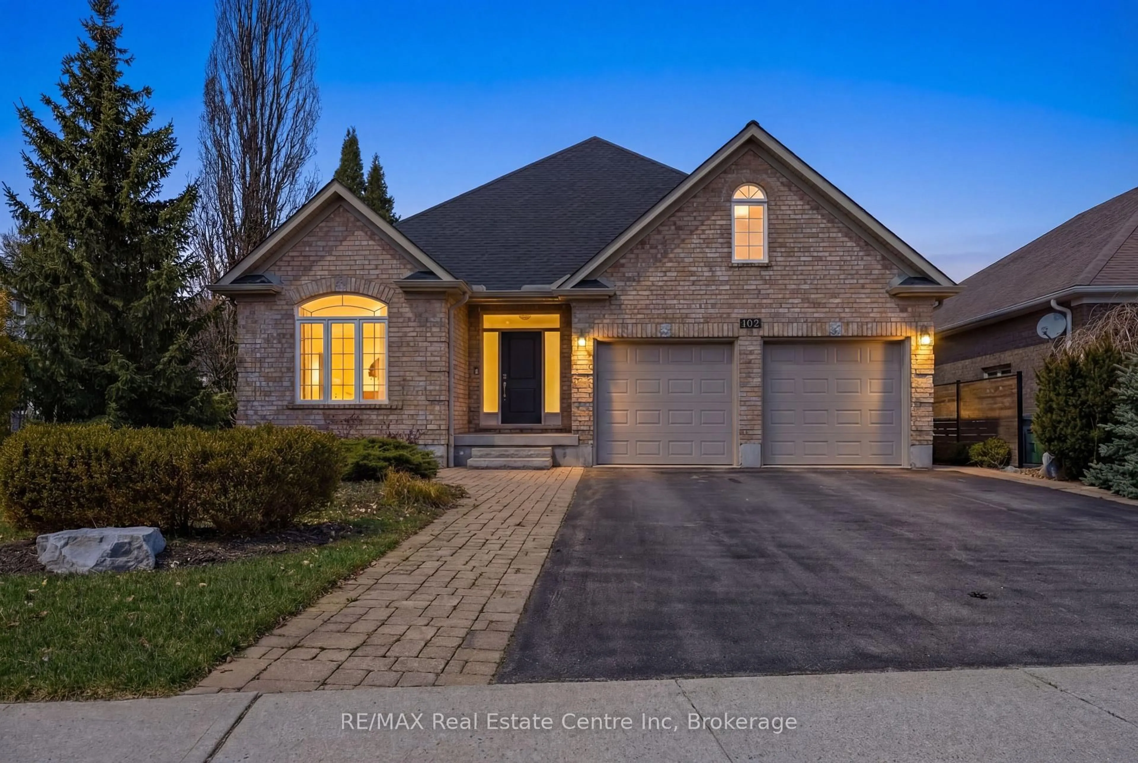 Home with brick exterior material, street for 102 Kortright Rd, Guelph Ontario N1G 0A5