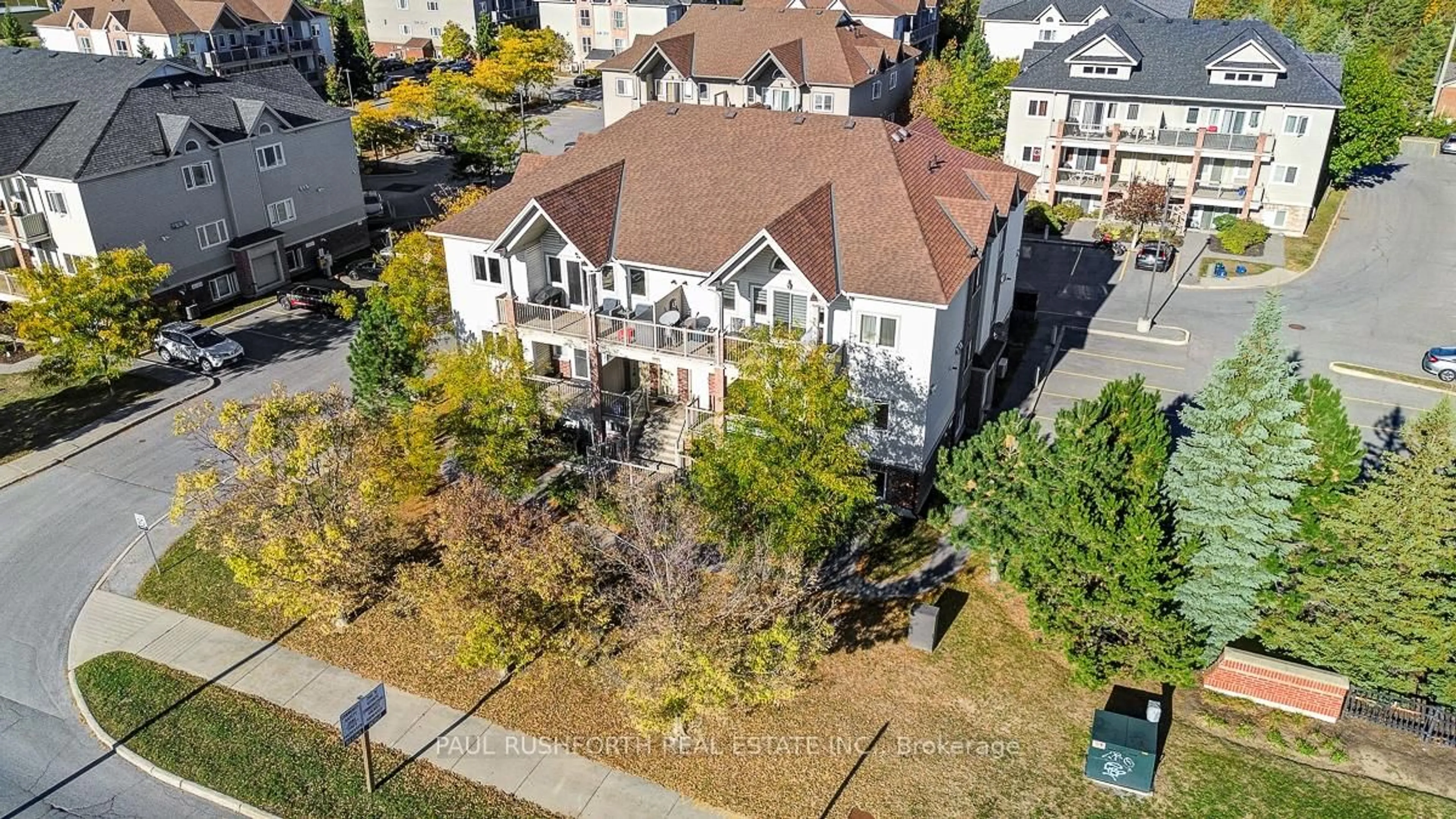 A pic from outside/outdoor area/front of a property/back of a property/a pic from drone, city buildings view from balcony for 1119 Stittsville Main St #G, Stittsville Ontario K2S 0C8