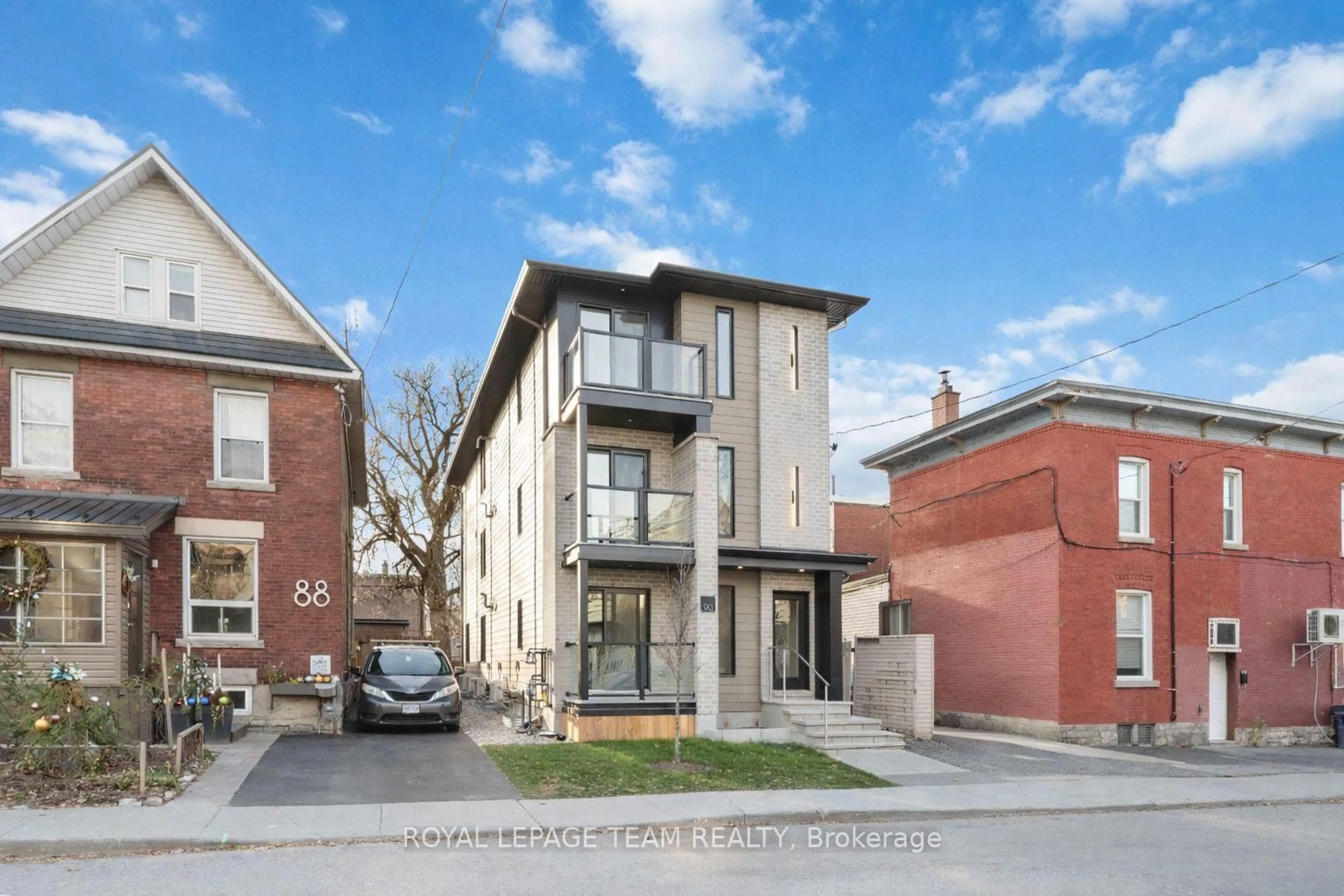 Home with brick exterior material, street for 90 Elm St, Ottawa Ontario K1R 6N3