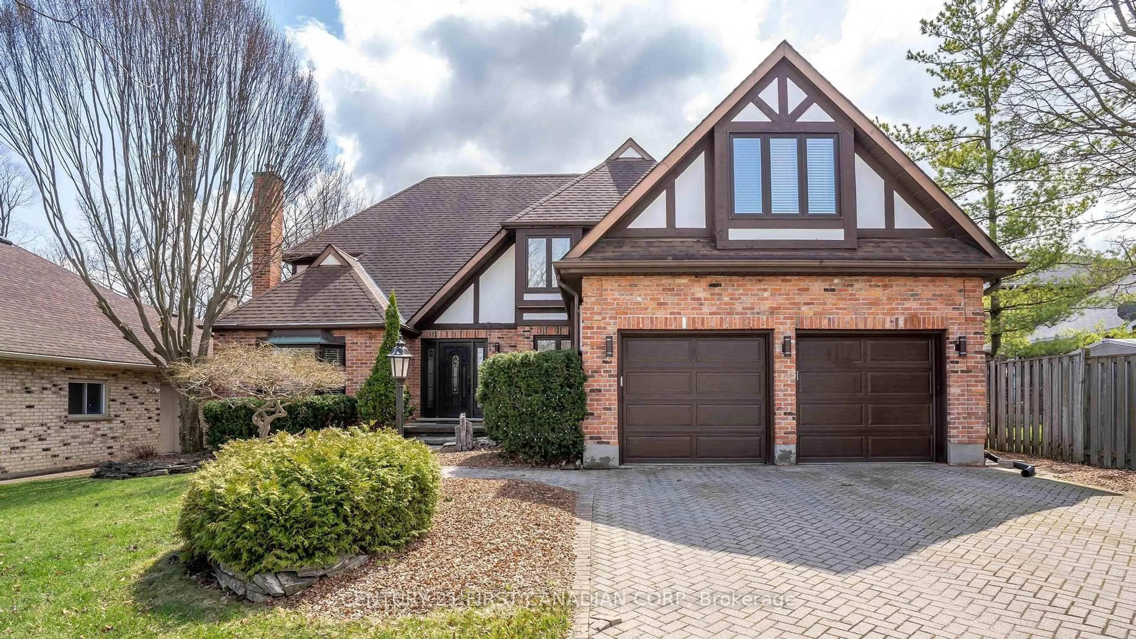 Home with brick exterior material, street for 135 Ambleside Dr, London North Ontario N6G 4P8