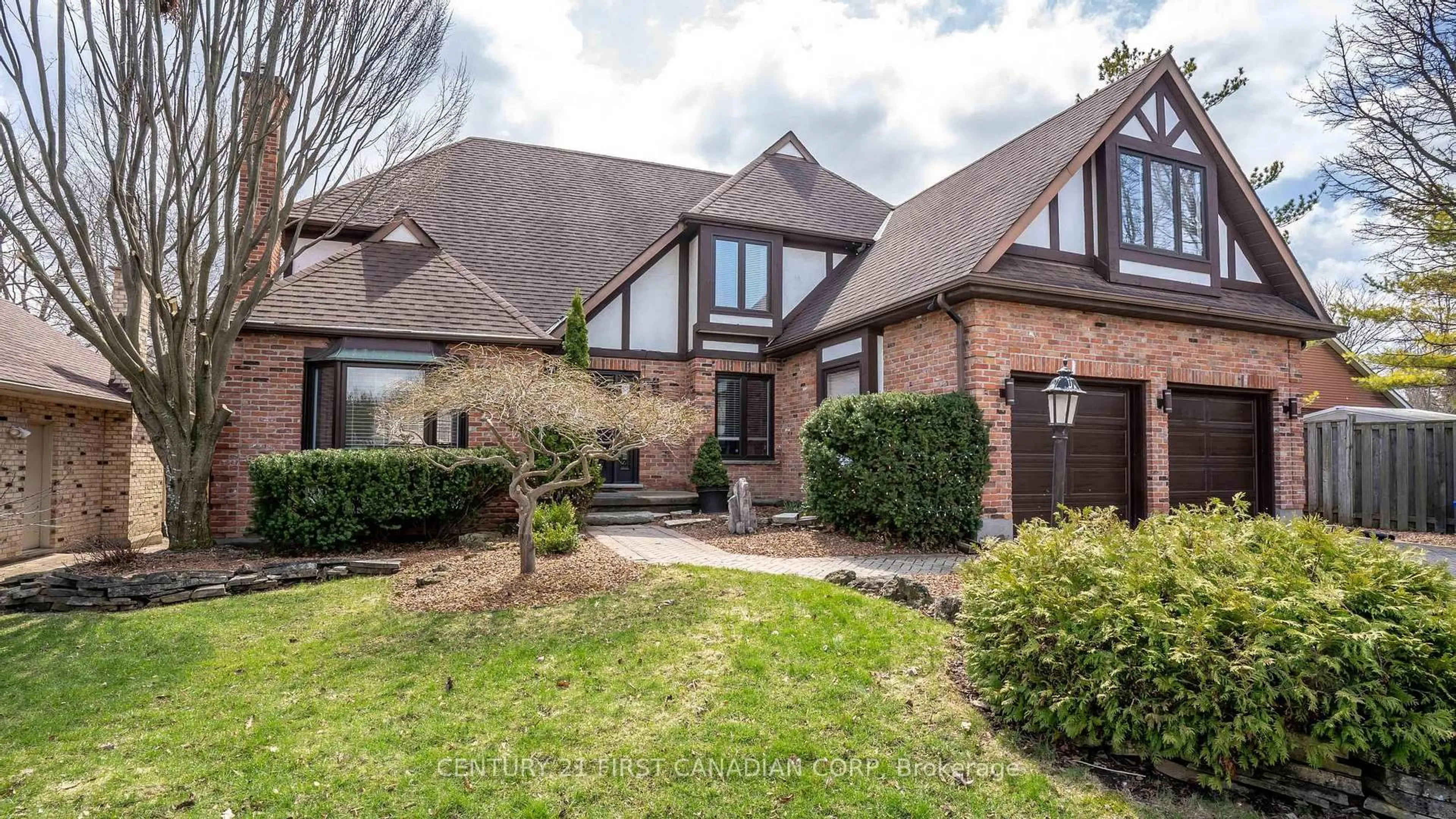 Home with brick exterior material, street for 135 Ambleside Dr, London North Ontario N6G 4P8