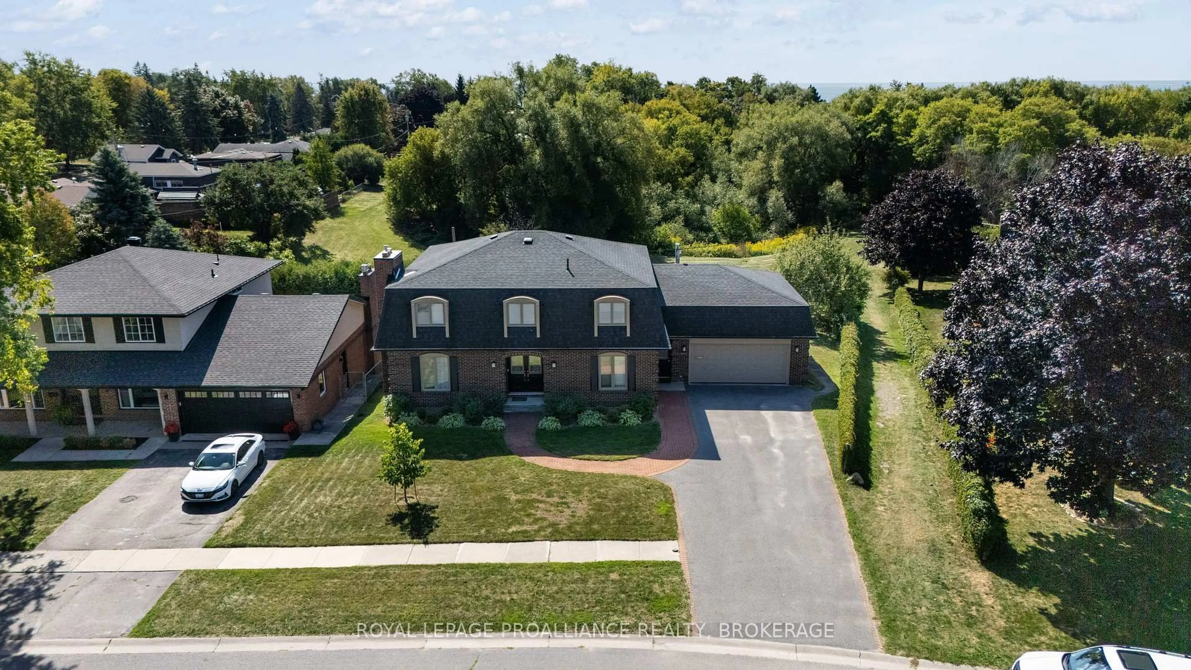 A pic from outside/outdoor area/front of a property/back of a property/a pic from drone, street for 907 Brodie Ave, Kingston Ontario K7M 4P8