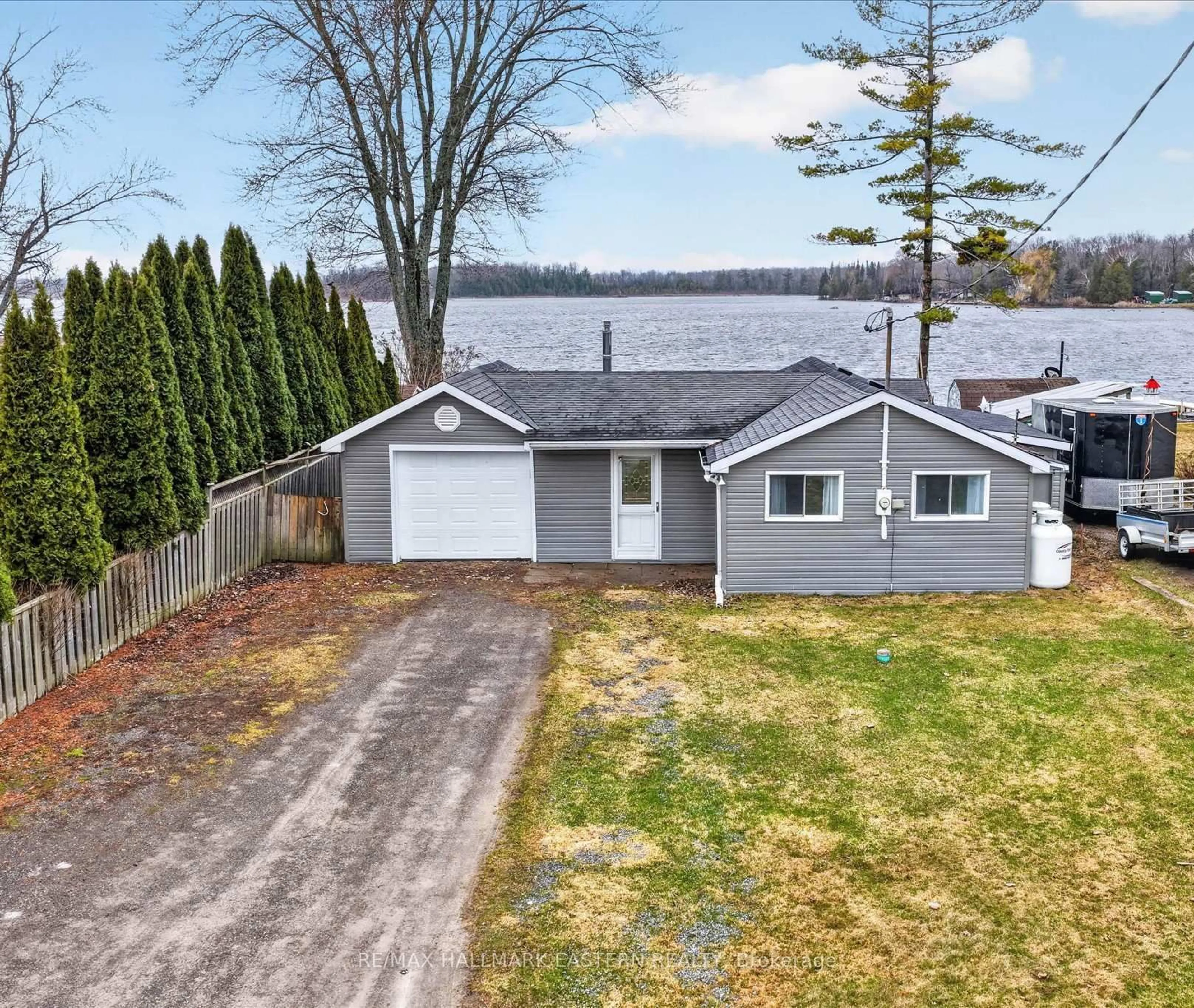 A pic from outside/outdoor area/front of a property/back of a property/a pic from drone, street for 252 Lake Rd, Trent Hills Ontario K0K 2M0