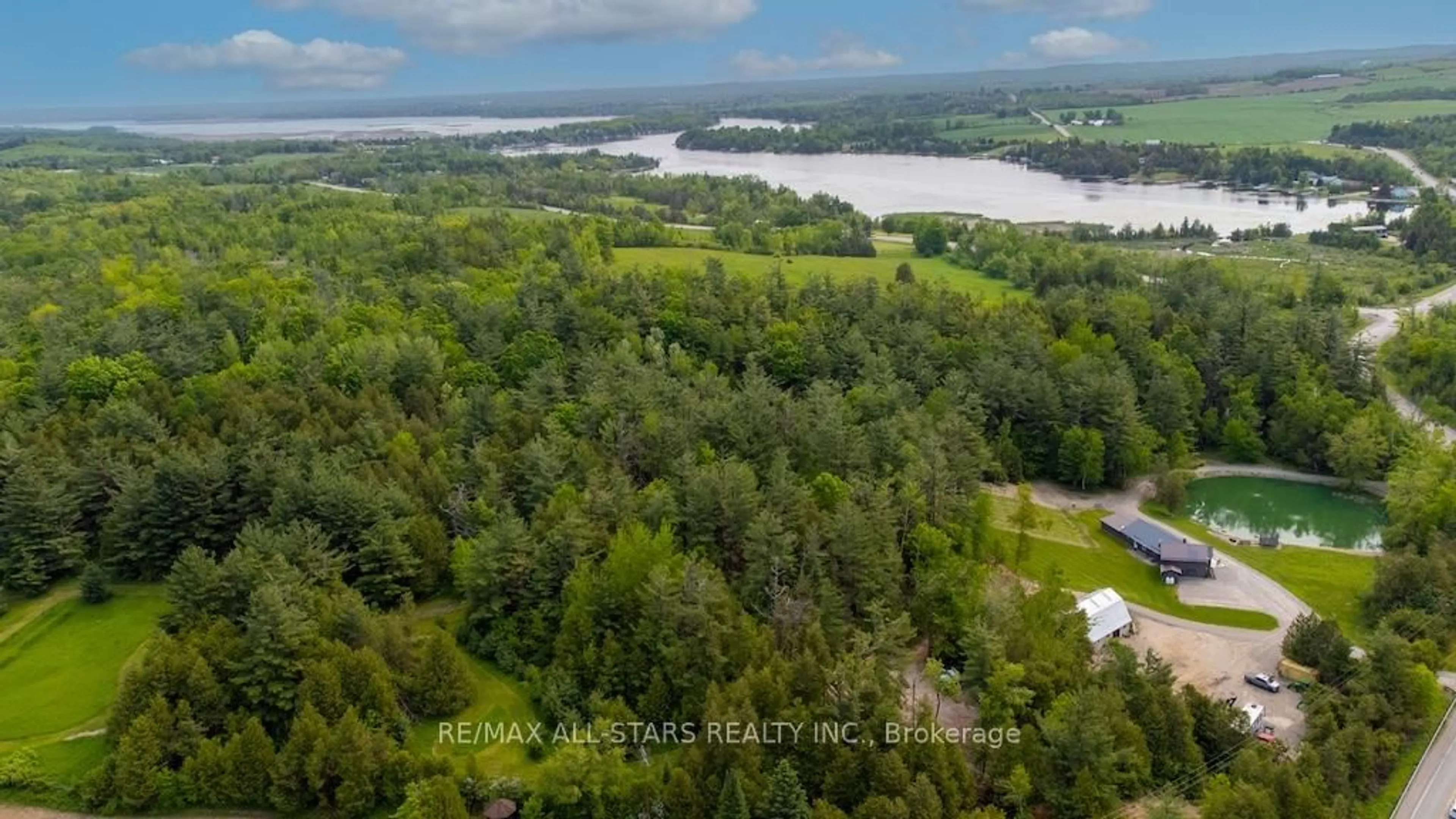 A pic from outside/outdoor area/front of a property/back of a property/a pic from drone, water/lake/river/ocean view for 829 Peace Rd, Kawartha Lakes Ontario K0M 2L0