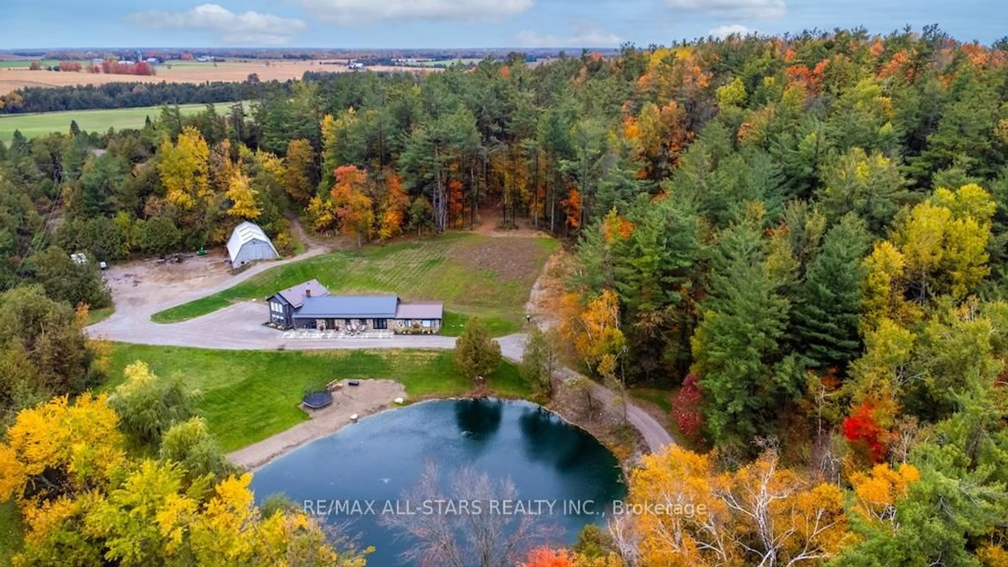 A pic from outside/outdoor area/front of a property/back of a property/a pic from drone, water/lake/river/ocean view for 829 Peace Rd, Kawartha Lakes Ontario K0M 2L0