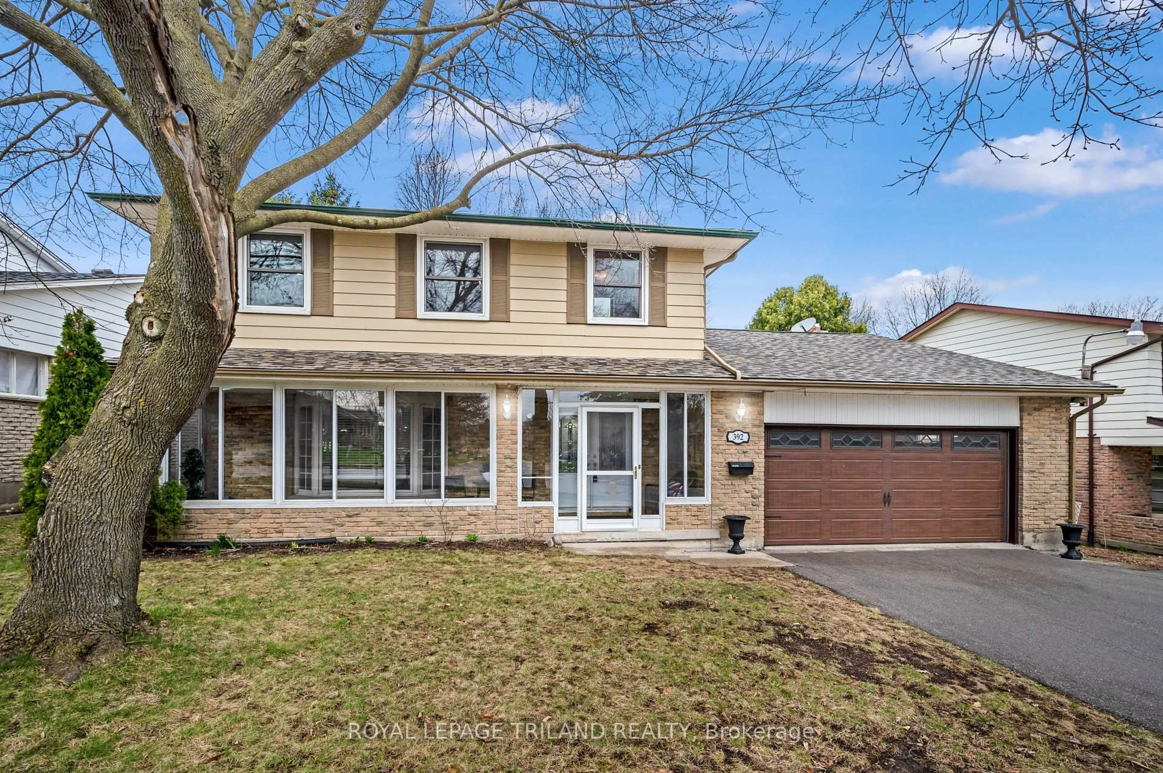 Home with vinyl exterior material, street for 392 Village Green Ave, London South Ontario N6J 3Z8