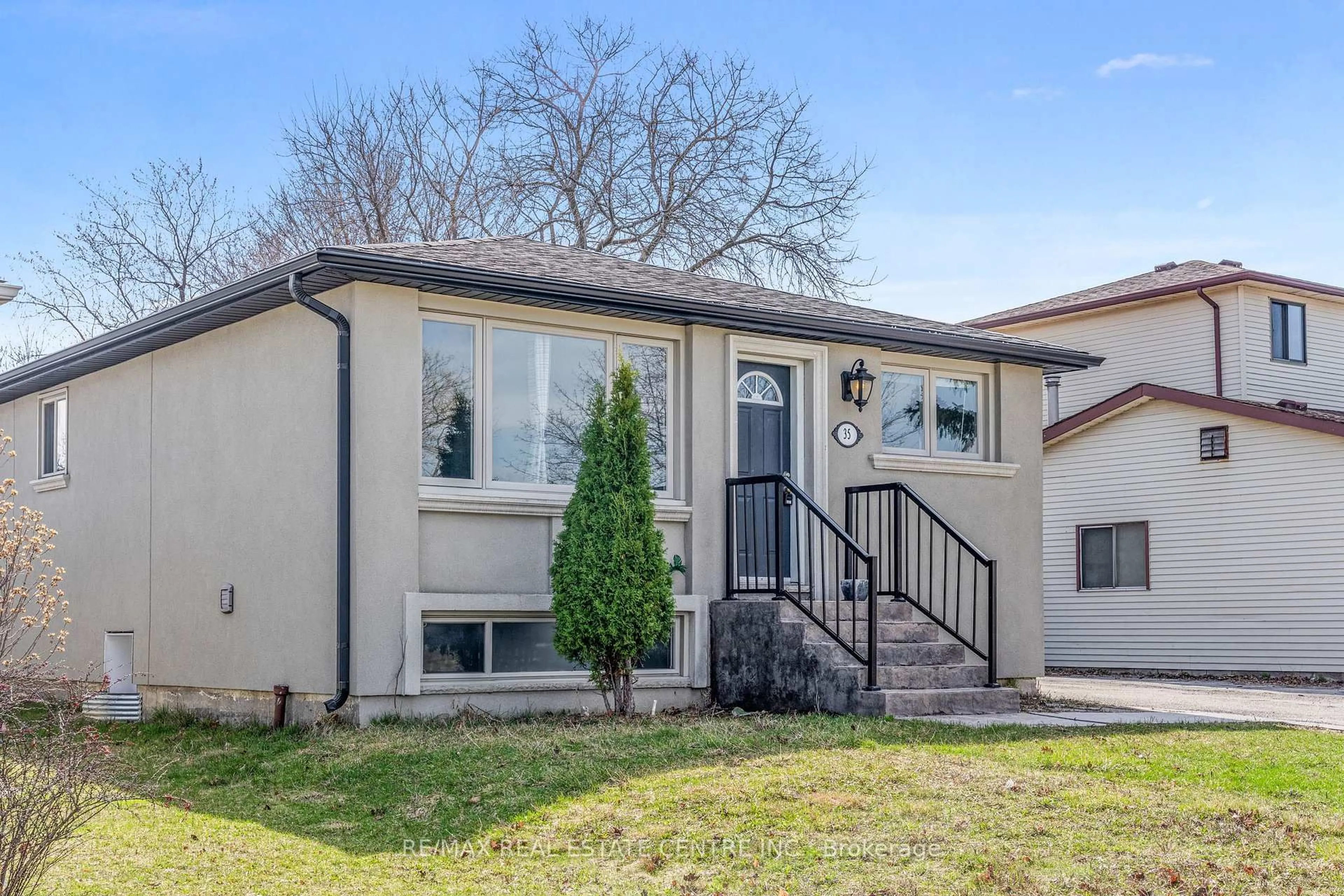 Home with vinyl exterior material, street for 35 Folkestone Ave, Hamilton Ontario L8V 4M9