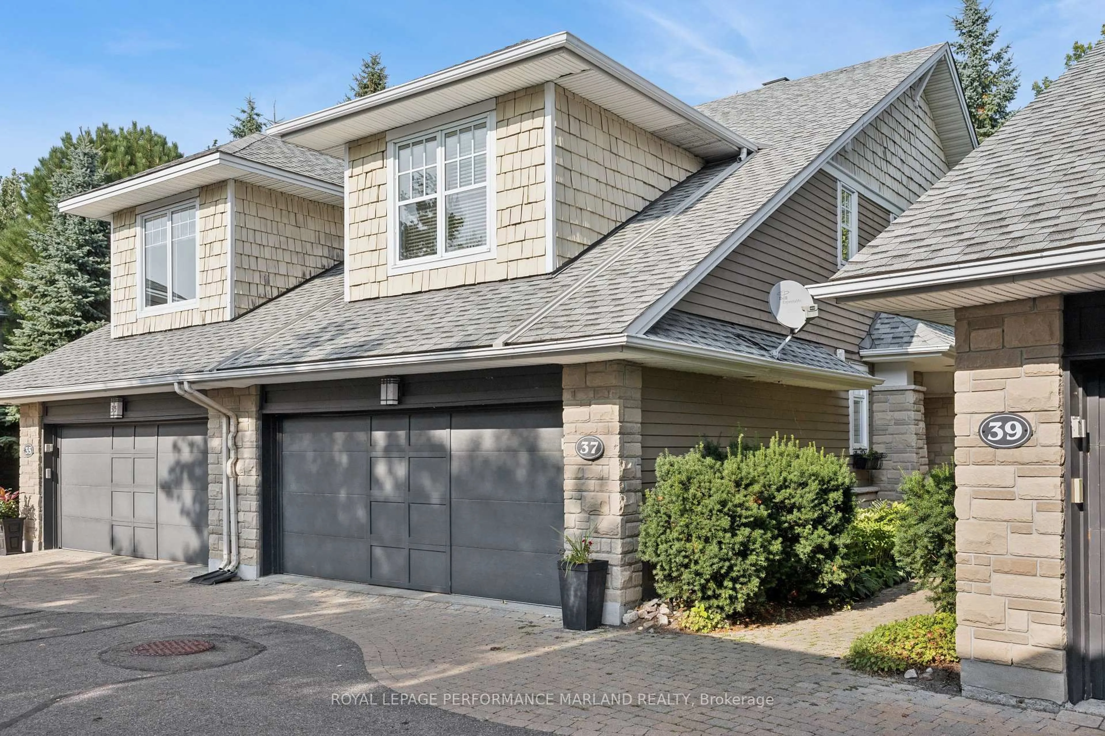 Home with vinyl exterior material, street for 37 Creek's End Lane, Nepean Ontario K2H 1C7