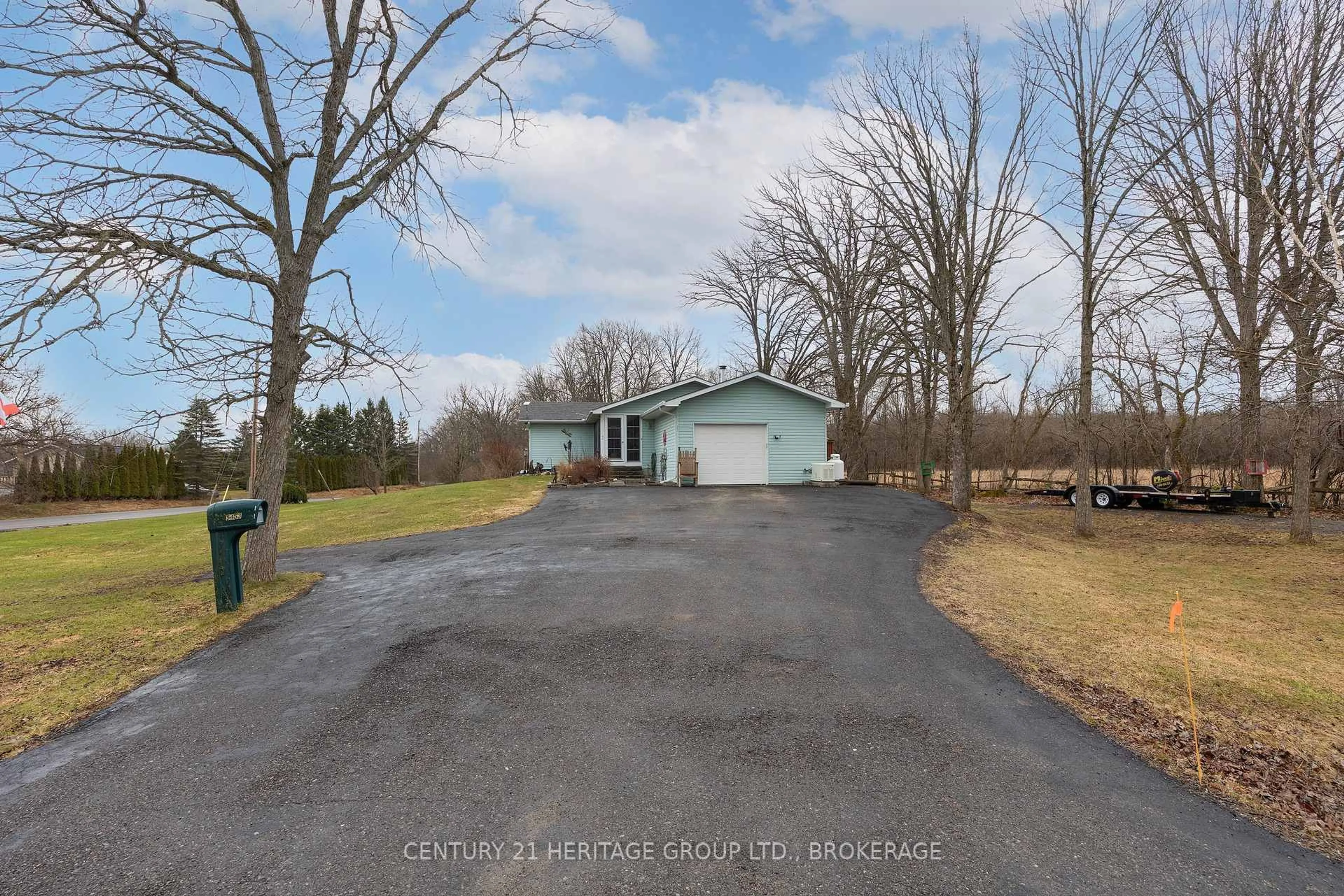 A pic from outside/outdoor area/front of a property/back of a property/a pic from drone, unknown for 5453 Petworth Rd, Harrowsmith Ontario K0H 1V0