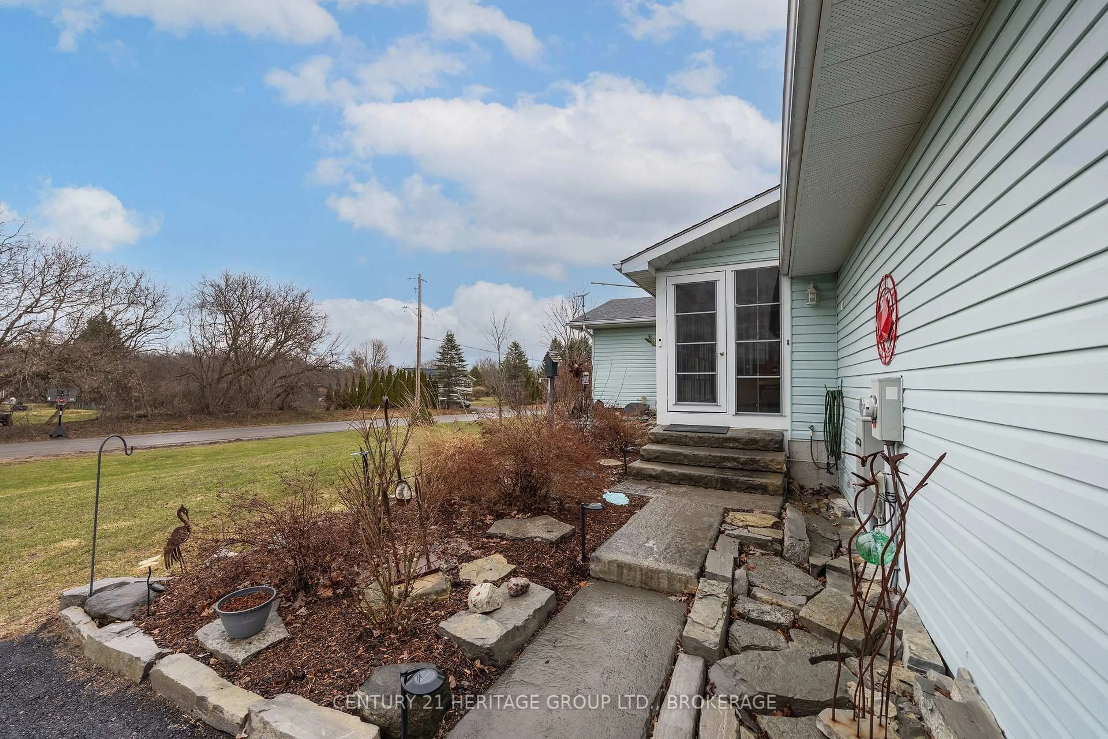 A pic from outside/outdoor area/front of a property/back of a property/a pic from drone, water/lake/river/ocean view for 5453 Petworth Rd, Harrowsmith Ontario K0H 1V0