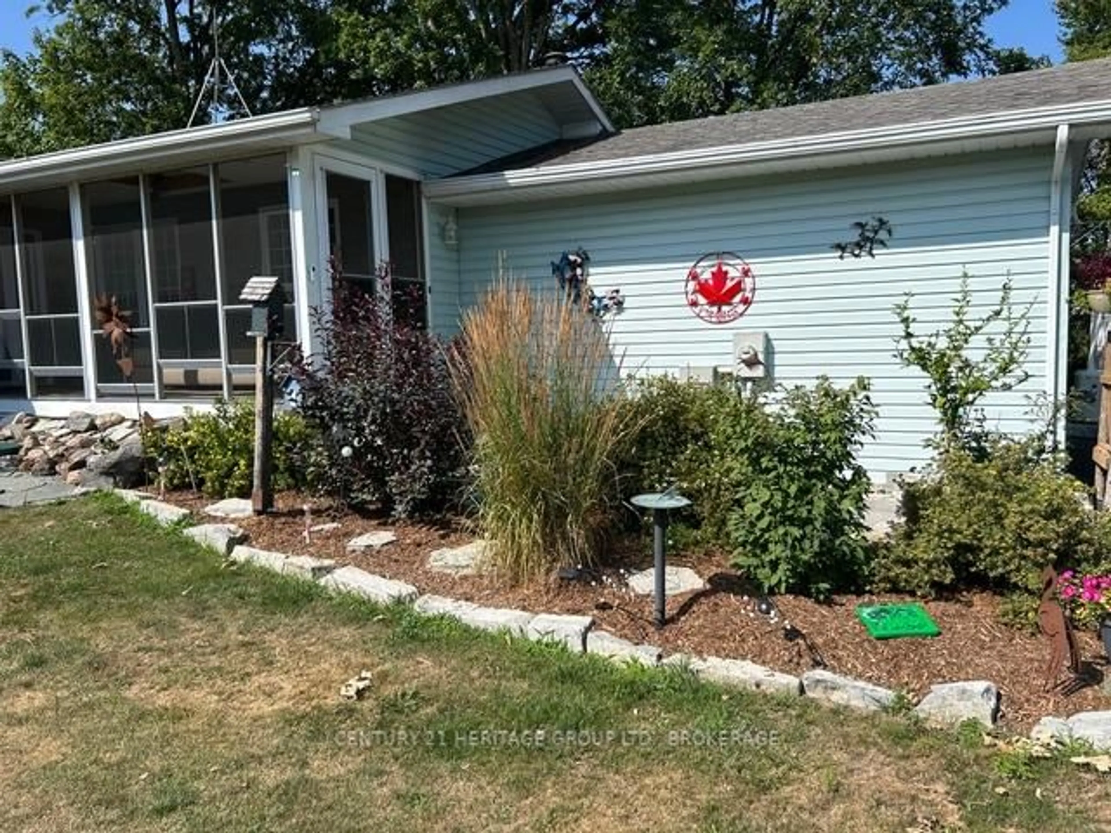 Home with vinyl exterior material, street for 5453 Petworth Rd, Harrowsmith Ontario K0H 1V0