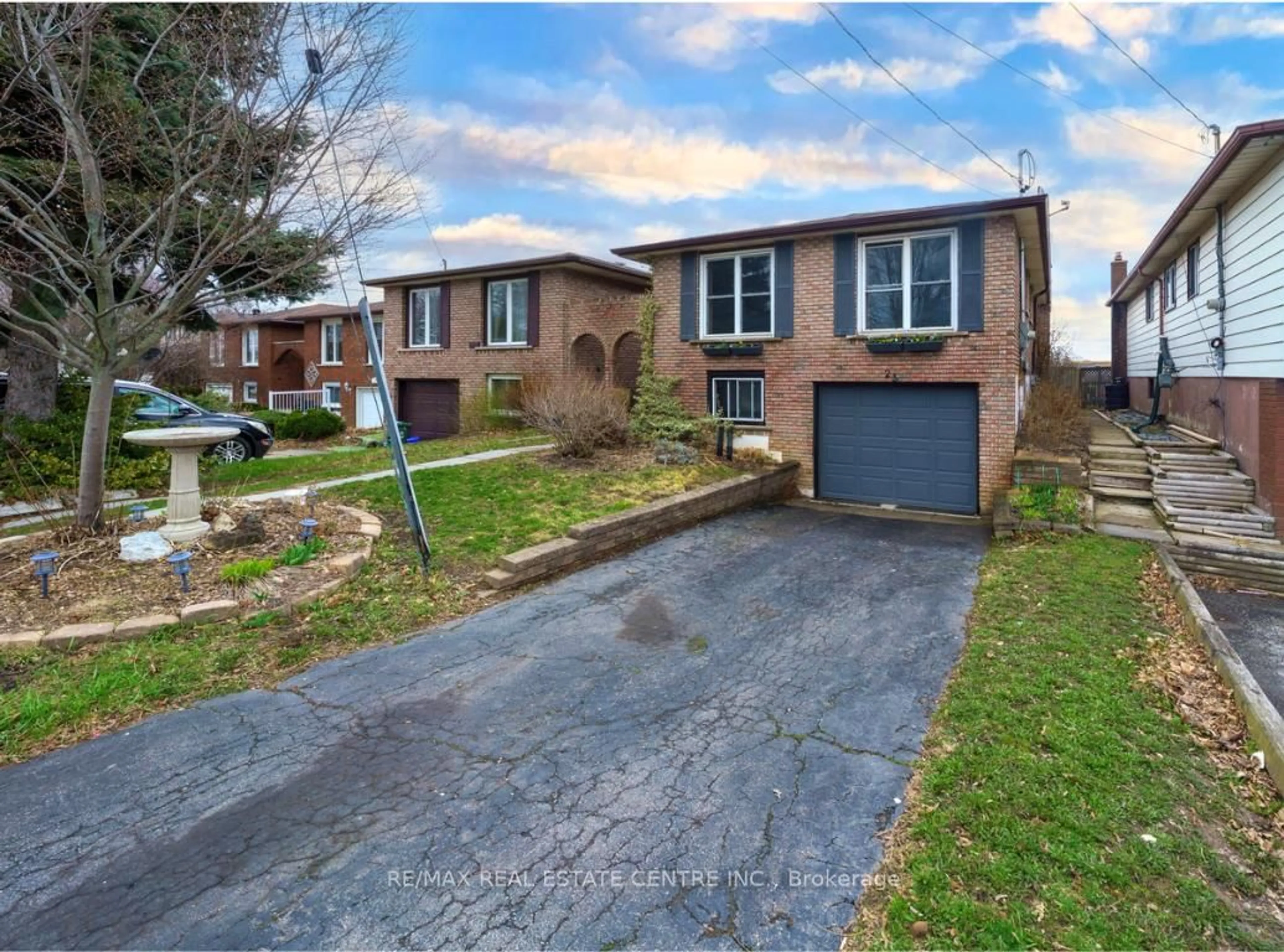 Home with brick exterior material, street for 23 Taymall St, Hamilton Ontario L8W 1Z7