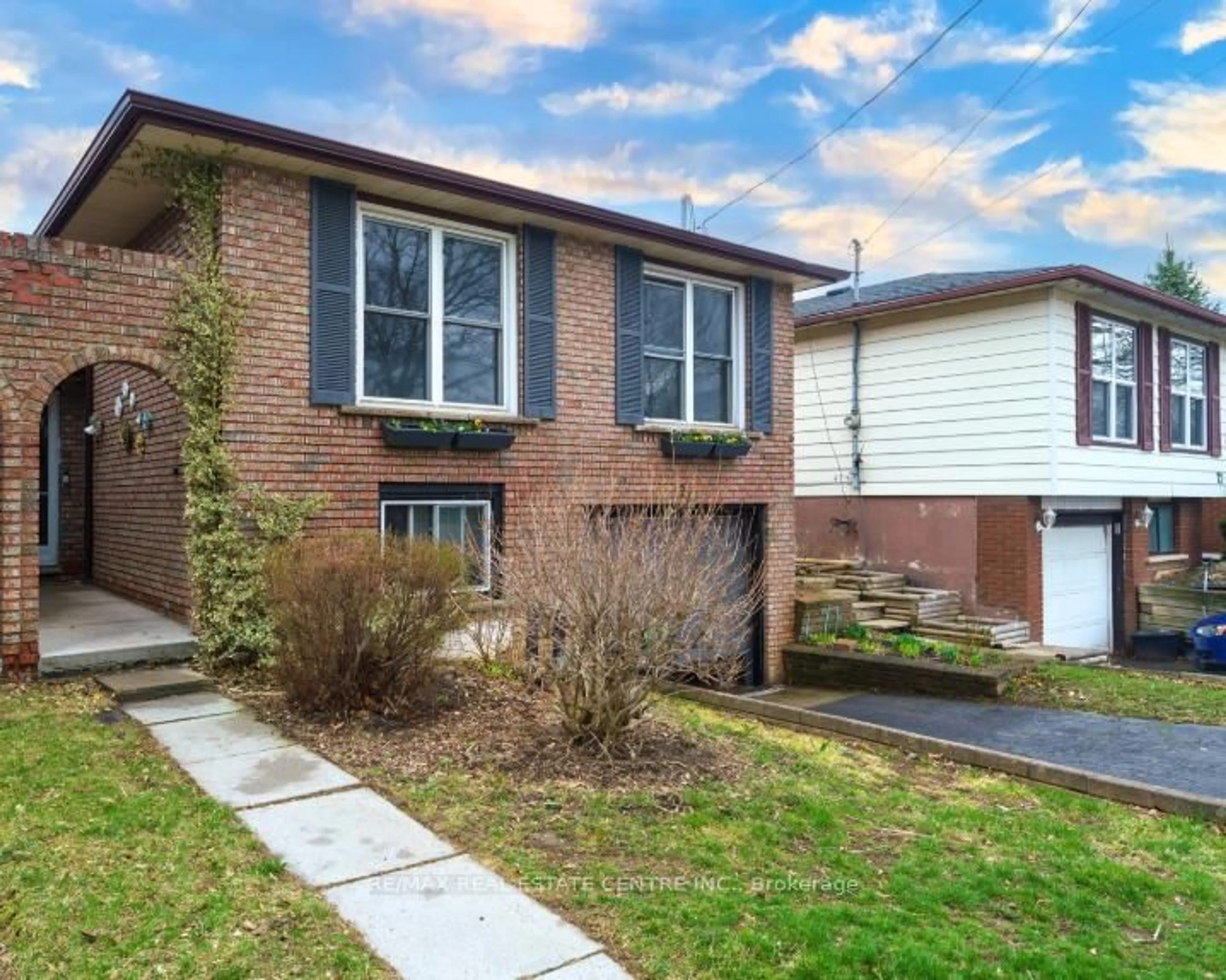 Home with brick exterior material, street for 23 Taymall St, Hamilton Ontario L8W 1Z7