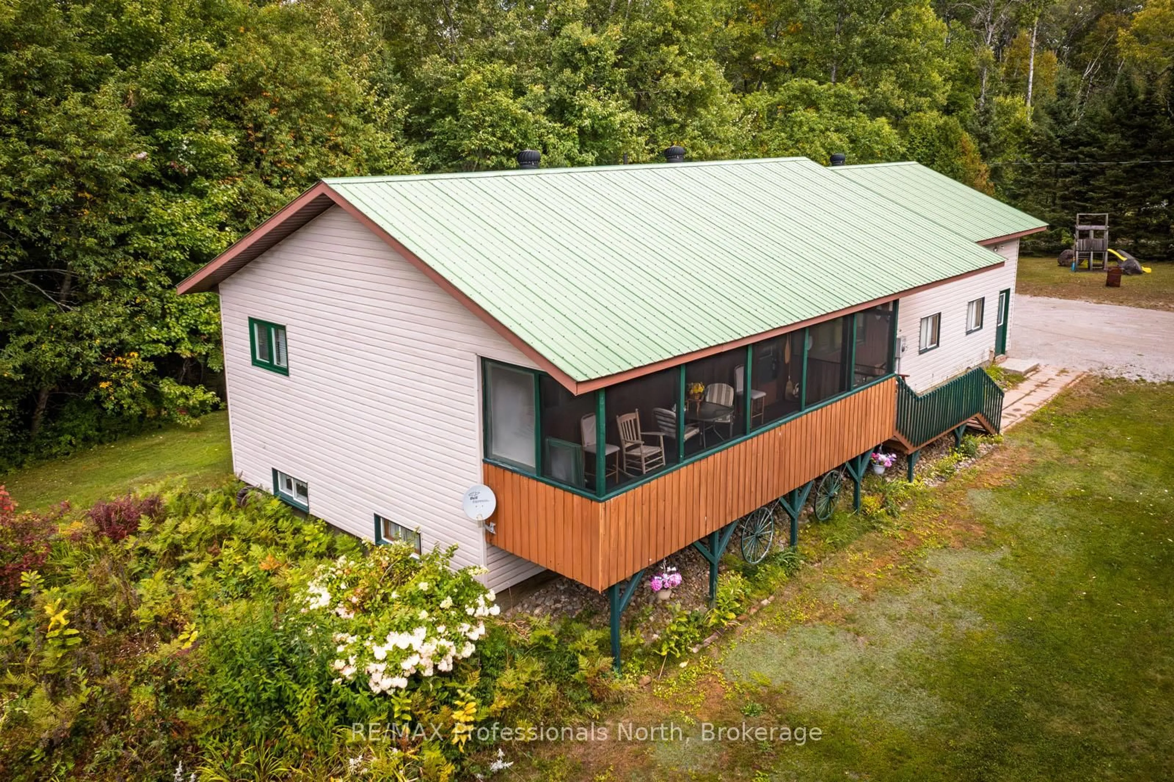 A pic from outside/outdoor area/front of a property/back of a property/a pic from drone, building for 66 Rain Lake Rd, Kearney Ontario P0A 1M0